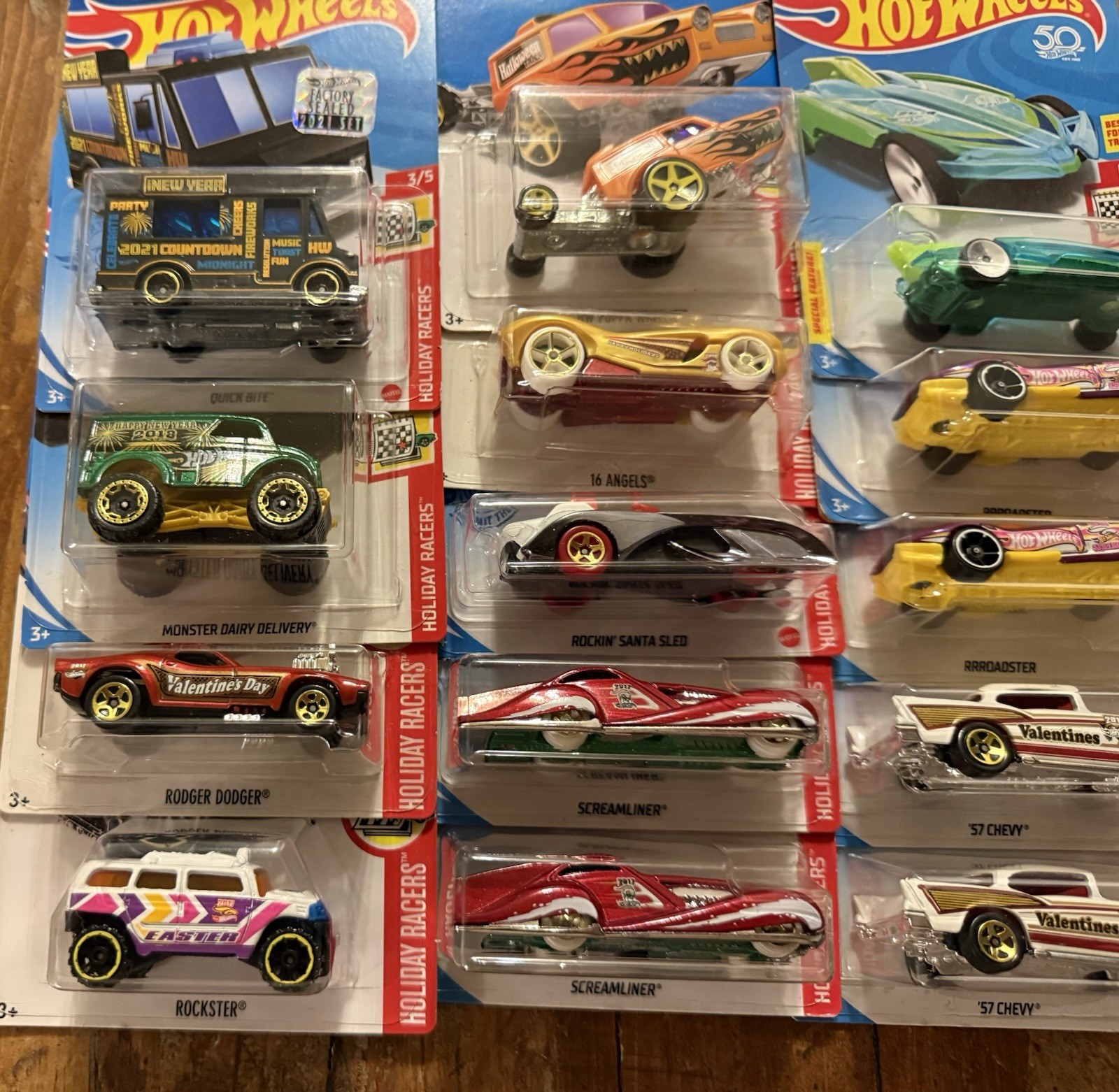 GROUP/LOT OF HOT WHEELS HOLIDAY RACERS! VARIOUS YEARS! 14 TOTAL DIE-CAST CARS!