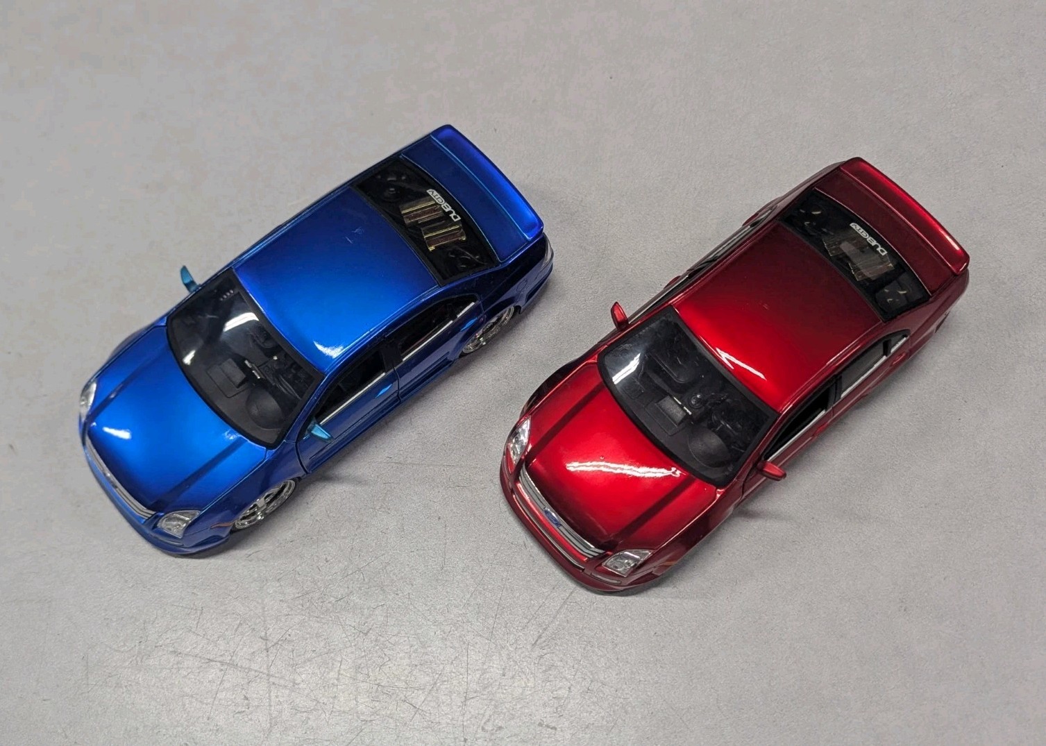 JADA DUB CITY 2006 FORD FUSION BLUE & RED 1:24 DIECAST MODEL USED Scuffs NO BOX