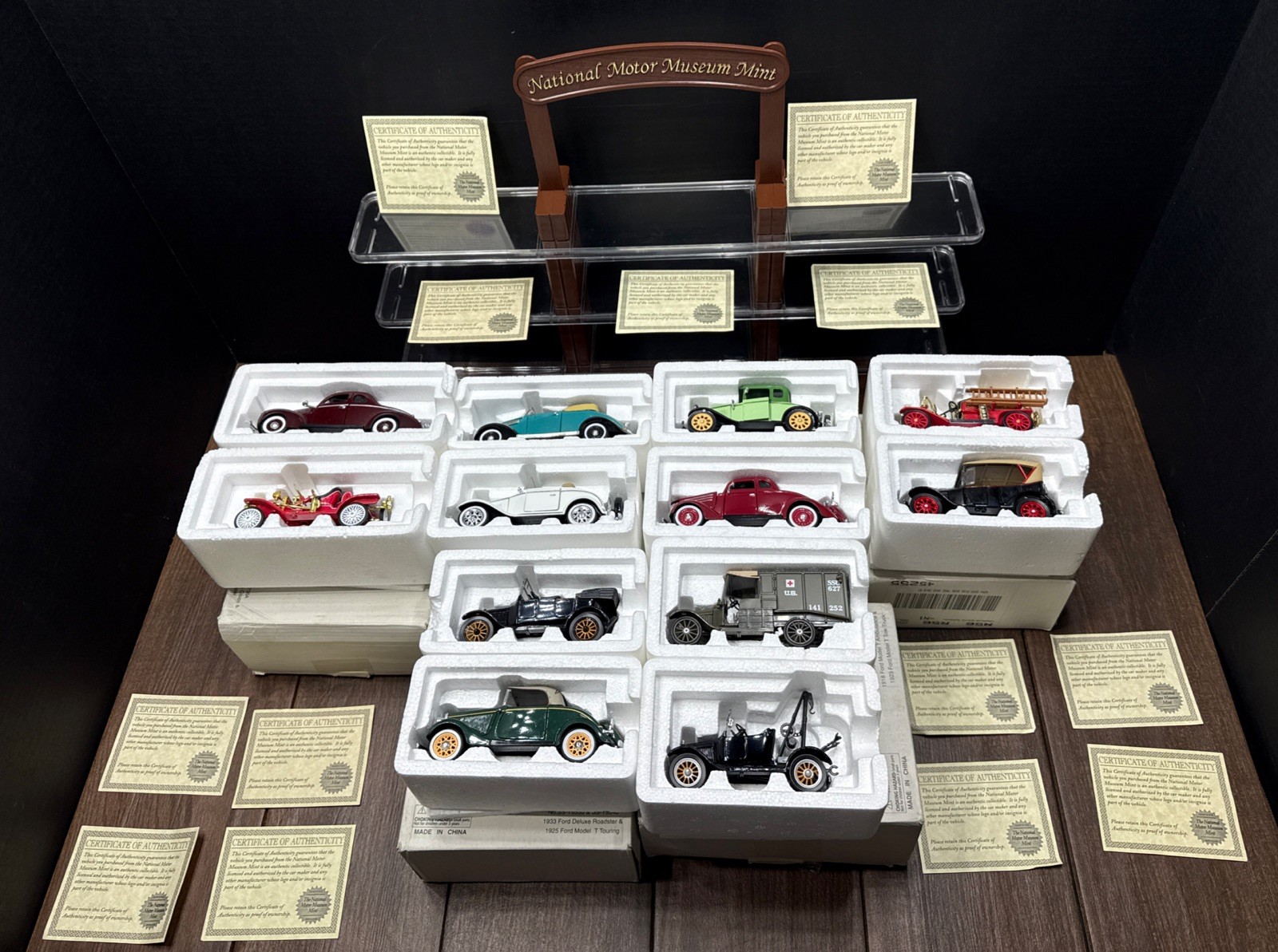 Lot Of 12 NATIONAL MOTOR MUSEUM MINT CARS WITH DISPLAY STAND