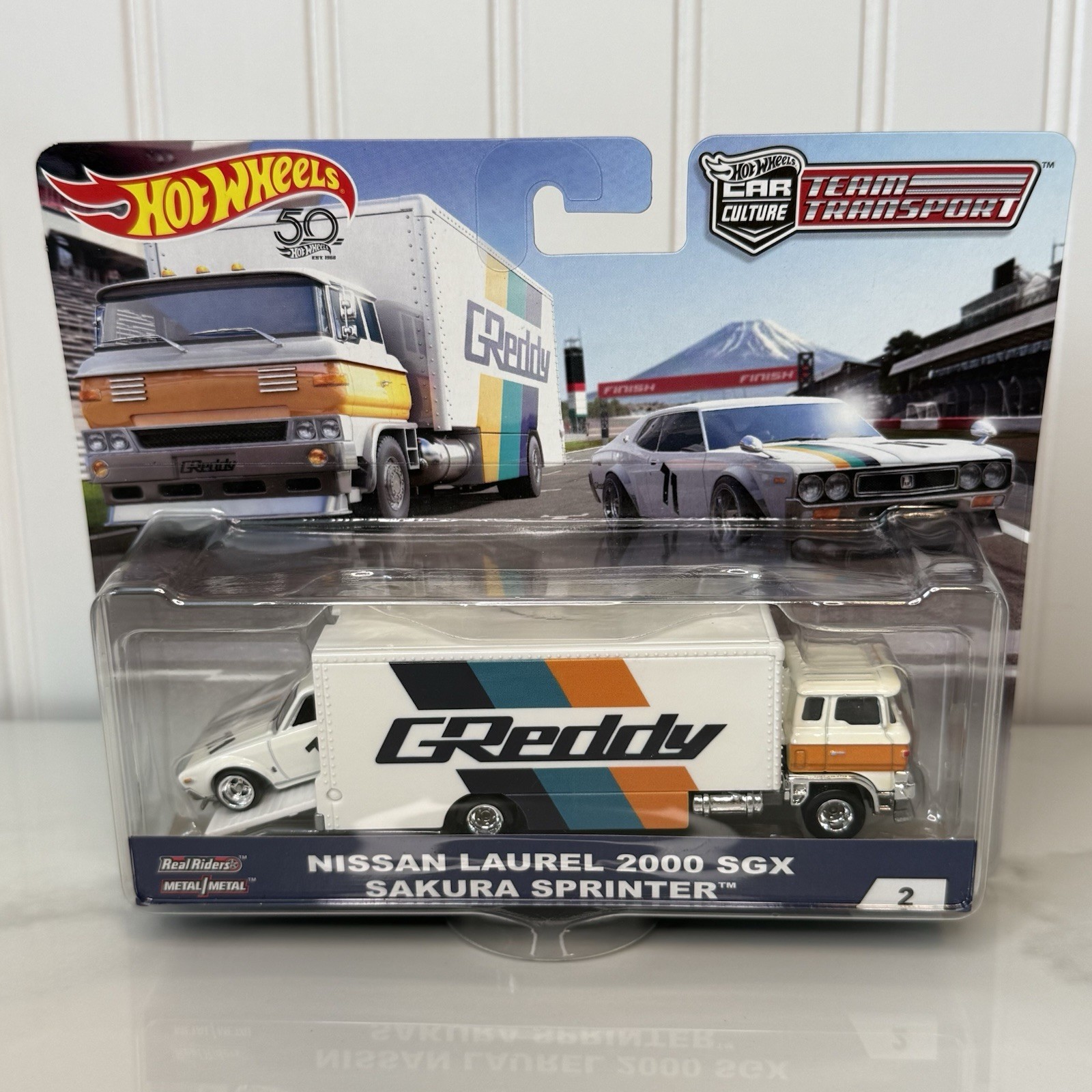 Hot Wheels Premium Team Transport Nissan Laurel 2000 SGX & Sakura Sprinter