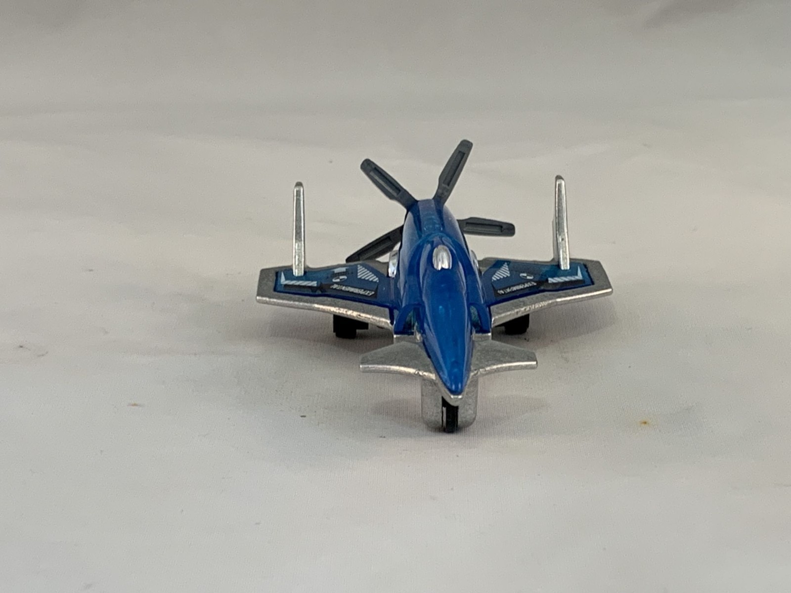 Hot Wheels Poison Arrow 2005 Kmart Clear Blue Micros