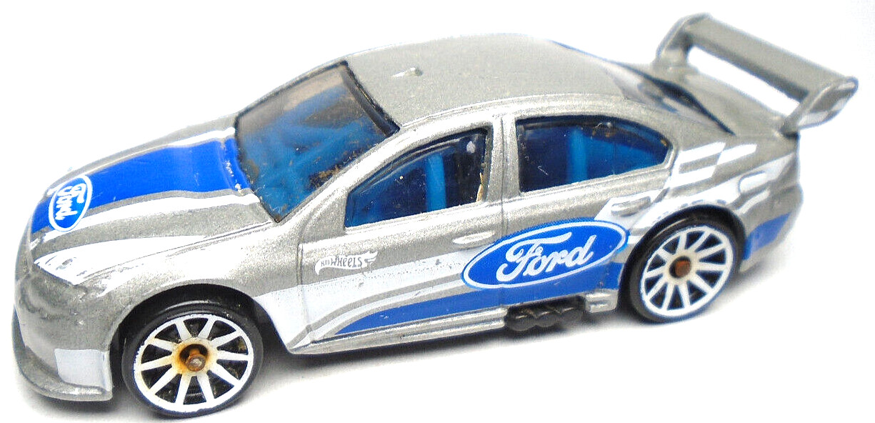 2021 HOT WHEELS FORD FALCON SILVER 1:64 DIECAST 3″ RACE CAR WITH BLUE & WHITE