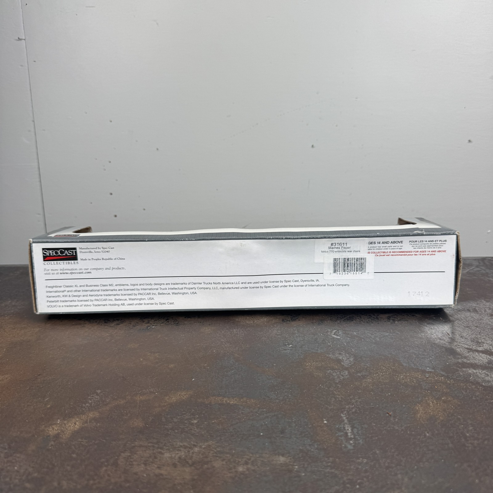 SpecCast Maines Paper / Tyson VOLVO 770 & Trailer 1:64 #31611
