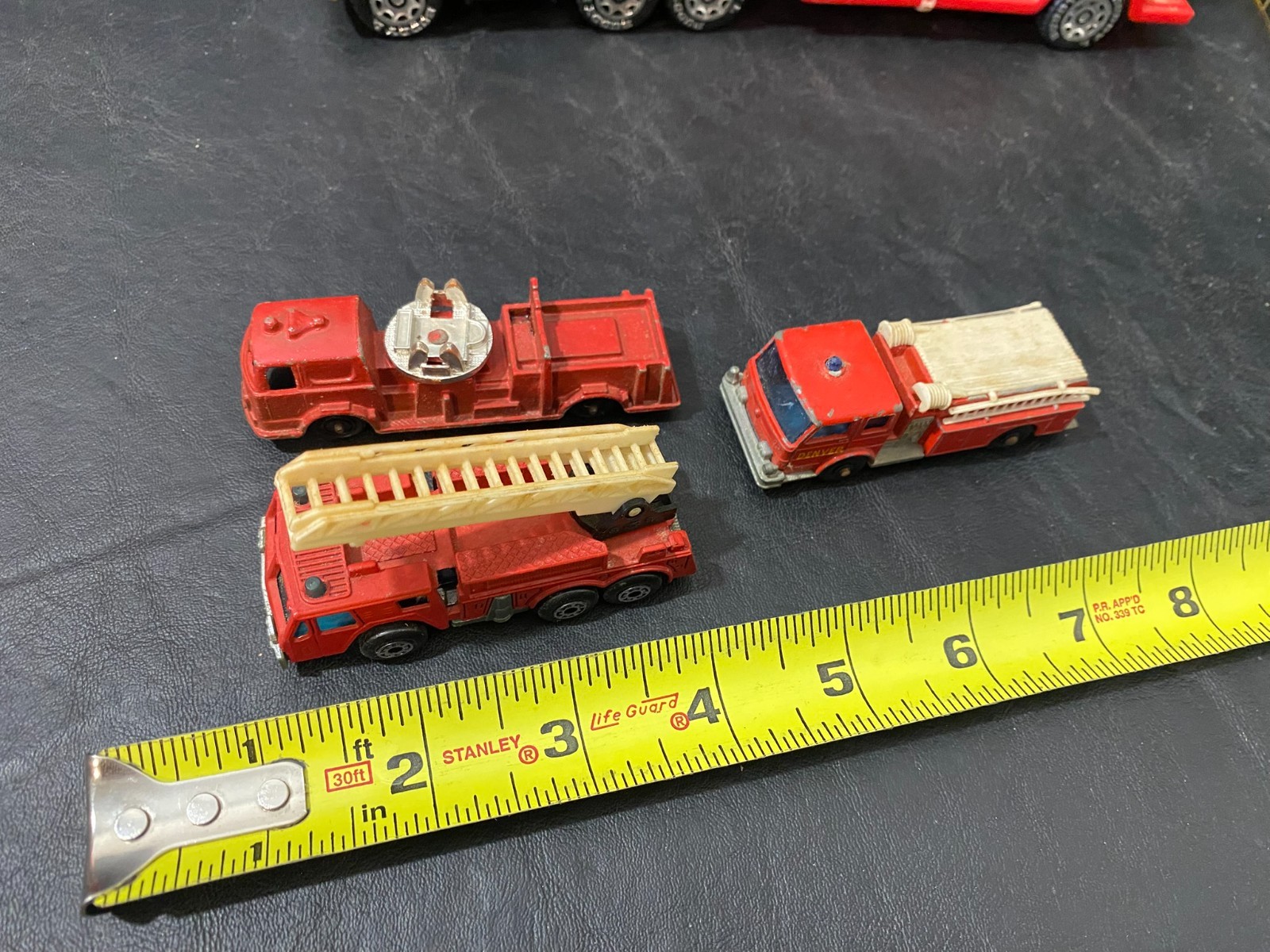 fire department collectibles cast iron Matchbox w/ belt buckle figure and more!