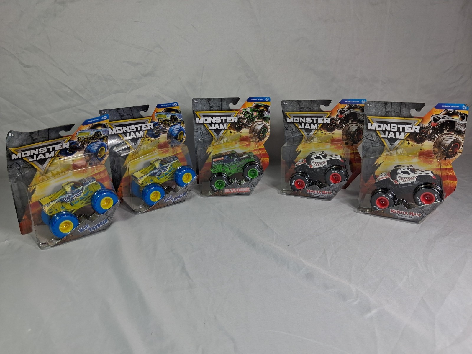 Lot of 5 Monster Jam 1:64 Diecast Trucks Blue Thunder Grave Digger Monster Mutt