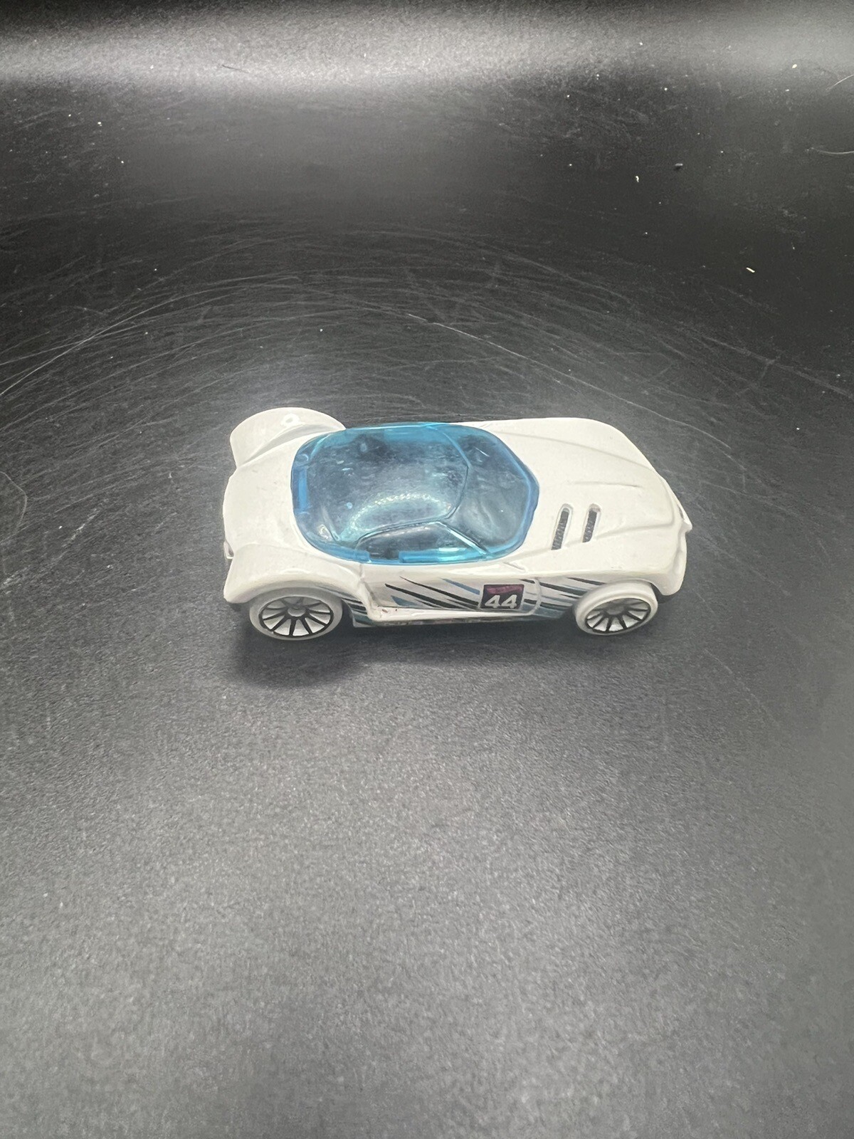 Hot Wheels Golden Arrow Toy Car White with Light Blue and Black Stripes 2016