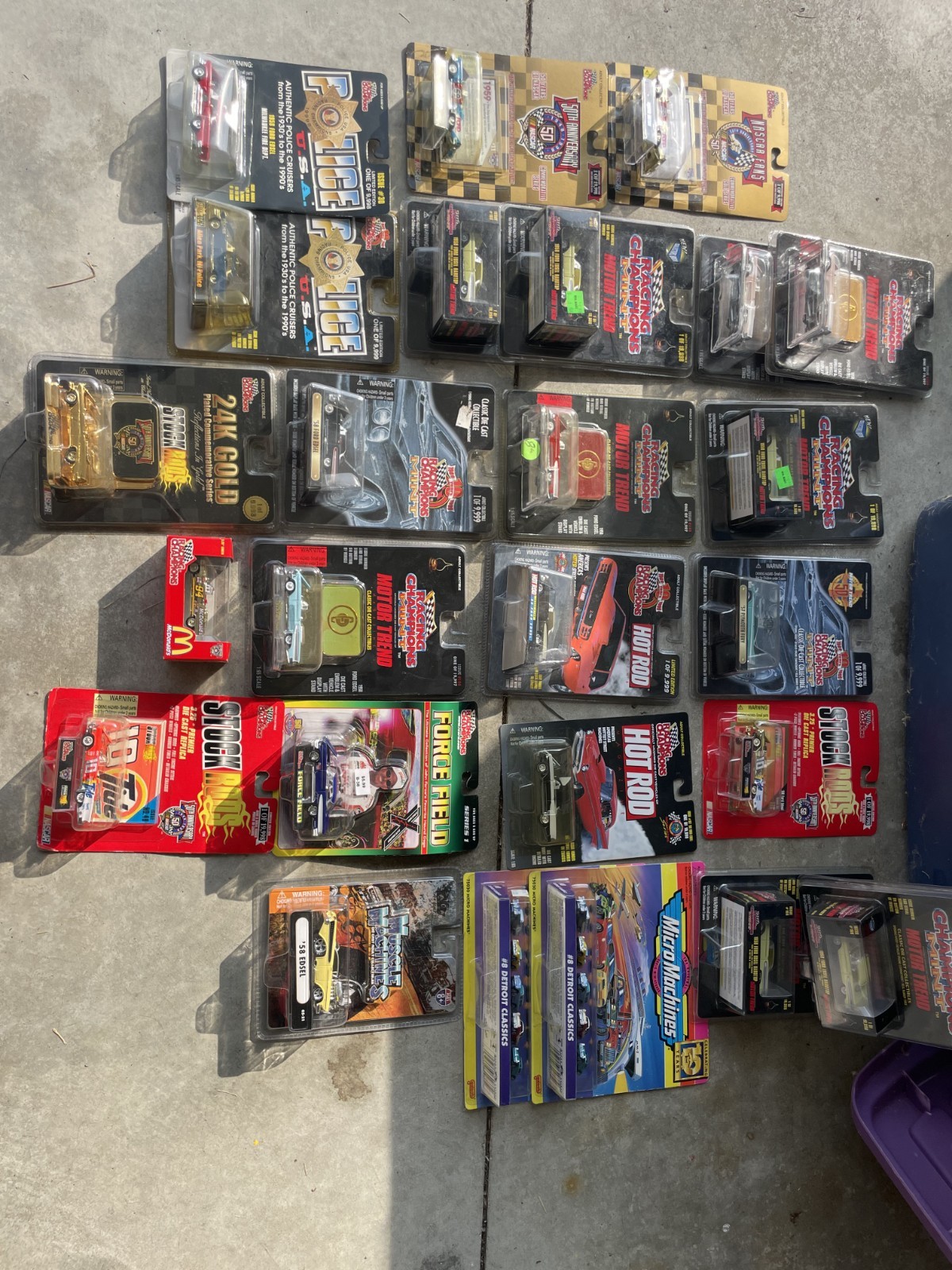 Various brands of 1:64 cars – new in packaging