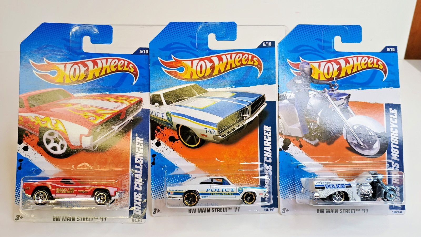 2010 Hot Wheels HW Main Street Lot of 3 ~ Police – Police Boss Hoss – Fire Dixie