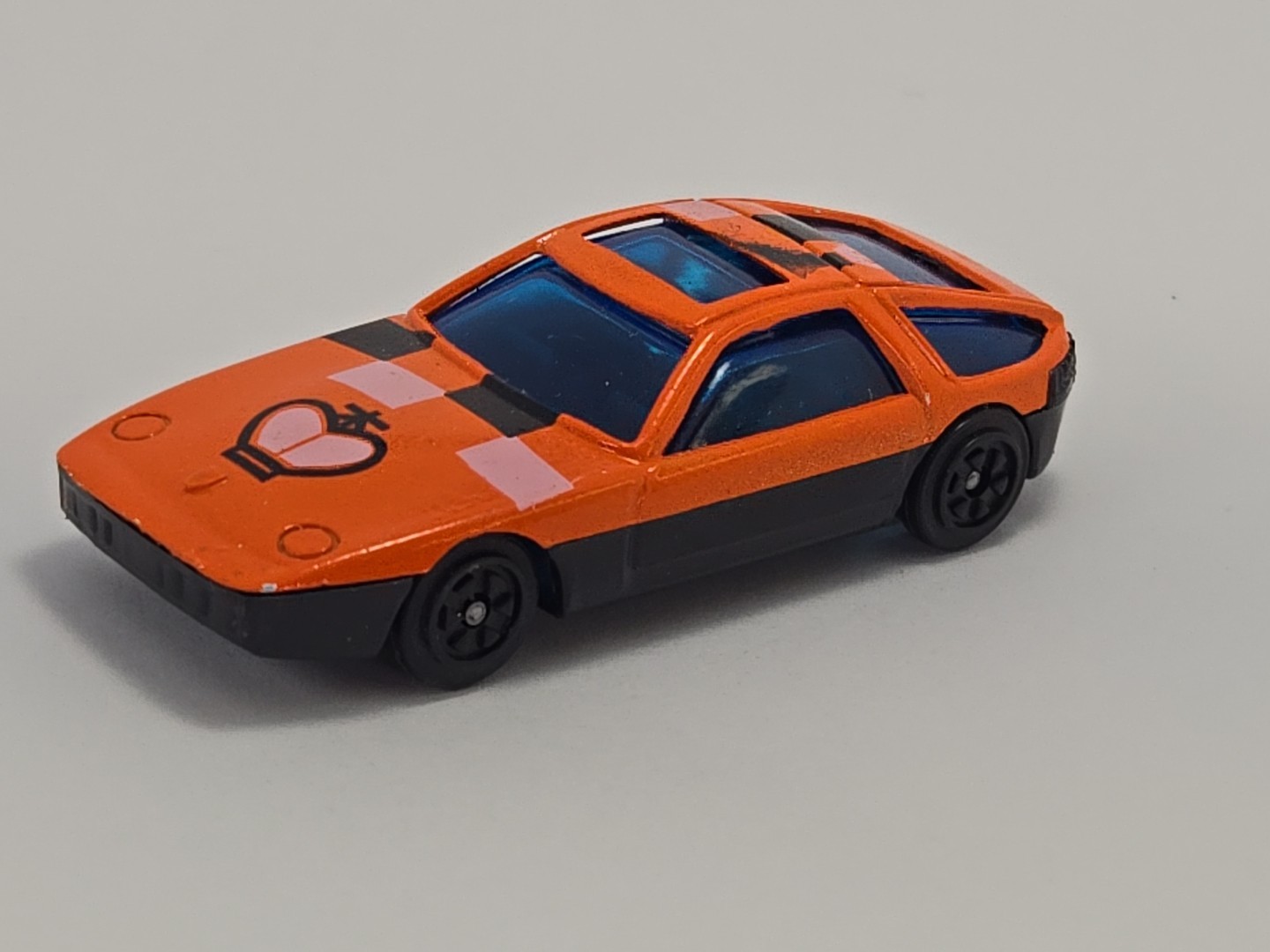 1977 – 1995 Porsche 928 1/64 Scale Collectible Crude Die-Cast Toy Car