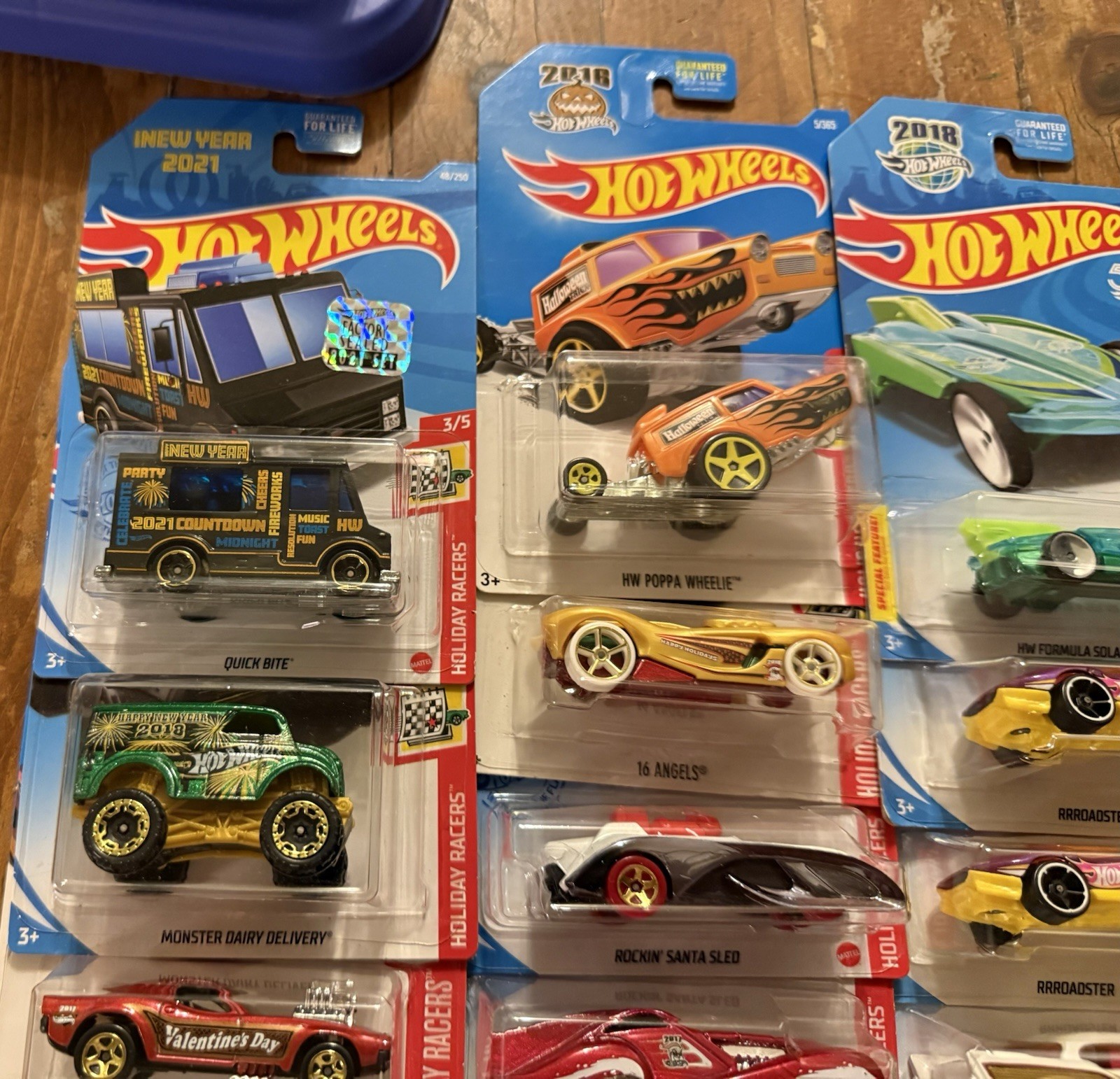 GROUP/LOT OF HOT WHEELS HOLIDAY RACERS! VARIOUS YEARS! 14 TOTAL DIE-CAST CARS!
