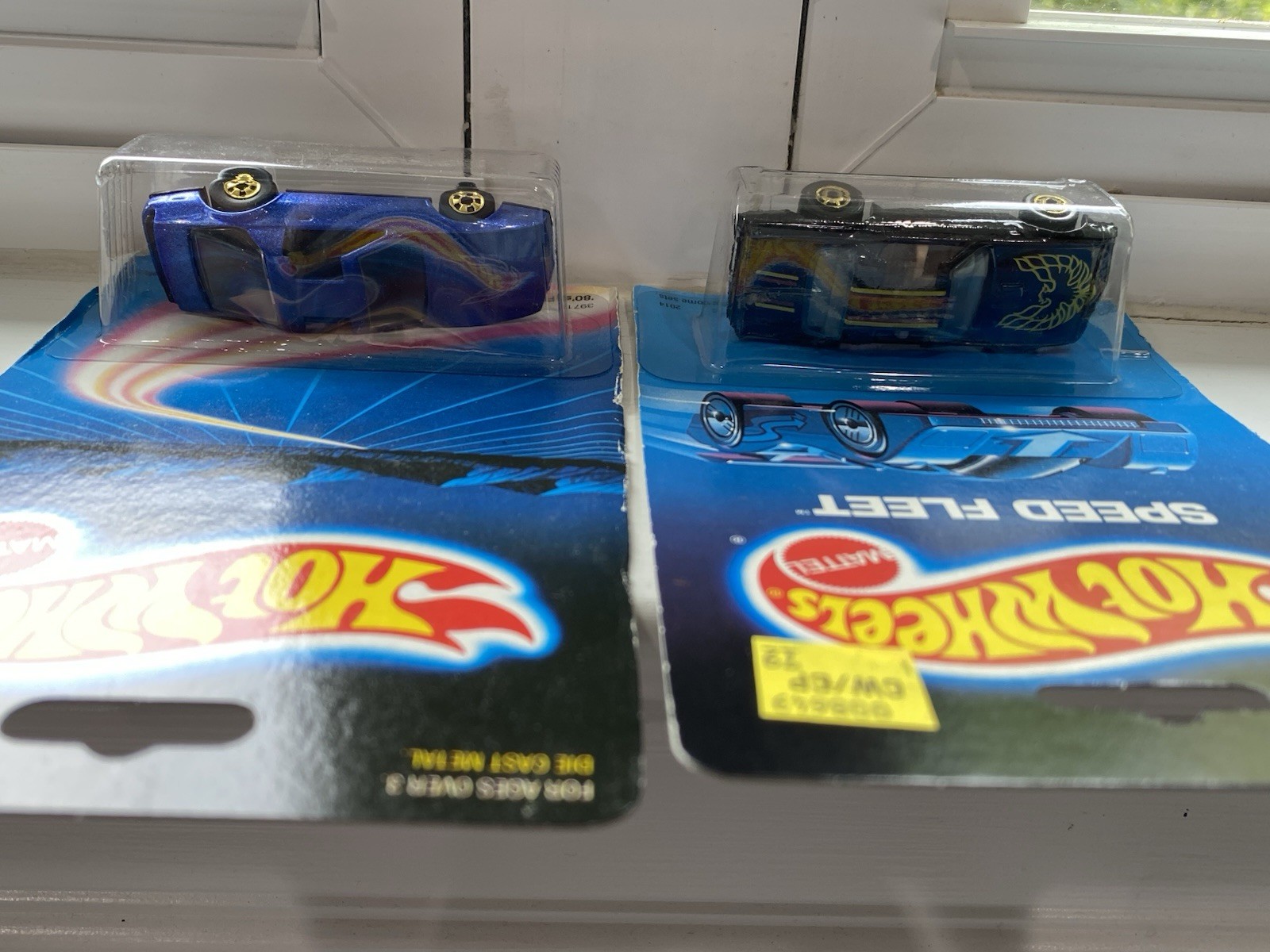 Hot Wheels ’80’s Firebird, Blue and Hot Bird, Black — 2 car set w/gold wheels