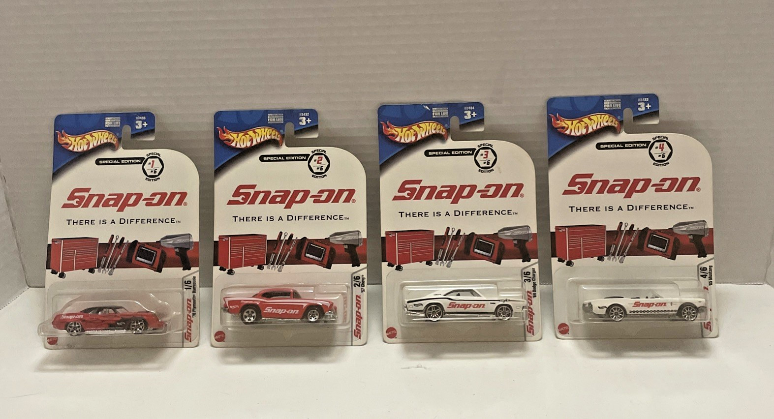 LOT OF 4 HOT WHEELS SNAP-ON CARS- 57 CHEVY, 70 BARRACUDA, 69 CHARGER, 75 MUSTANG
