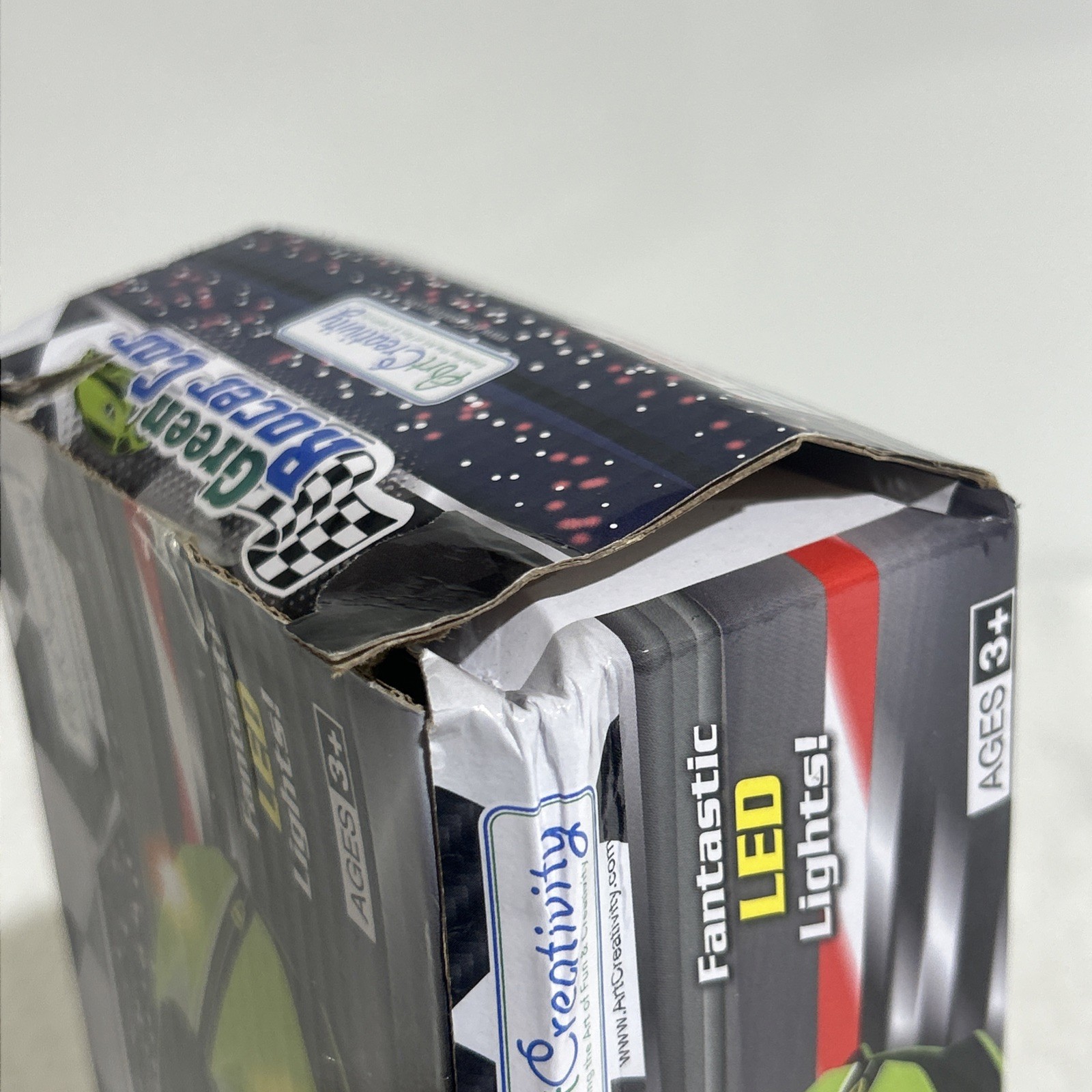 ART CREATIVITY GREEN RACER CAR PUSH N GO SPEED NEW IN DAMAGED BOX