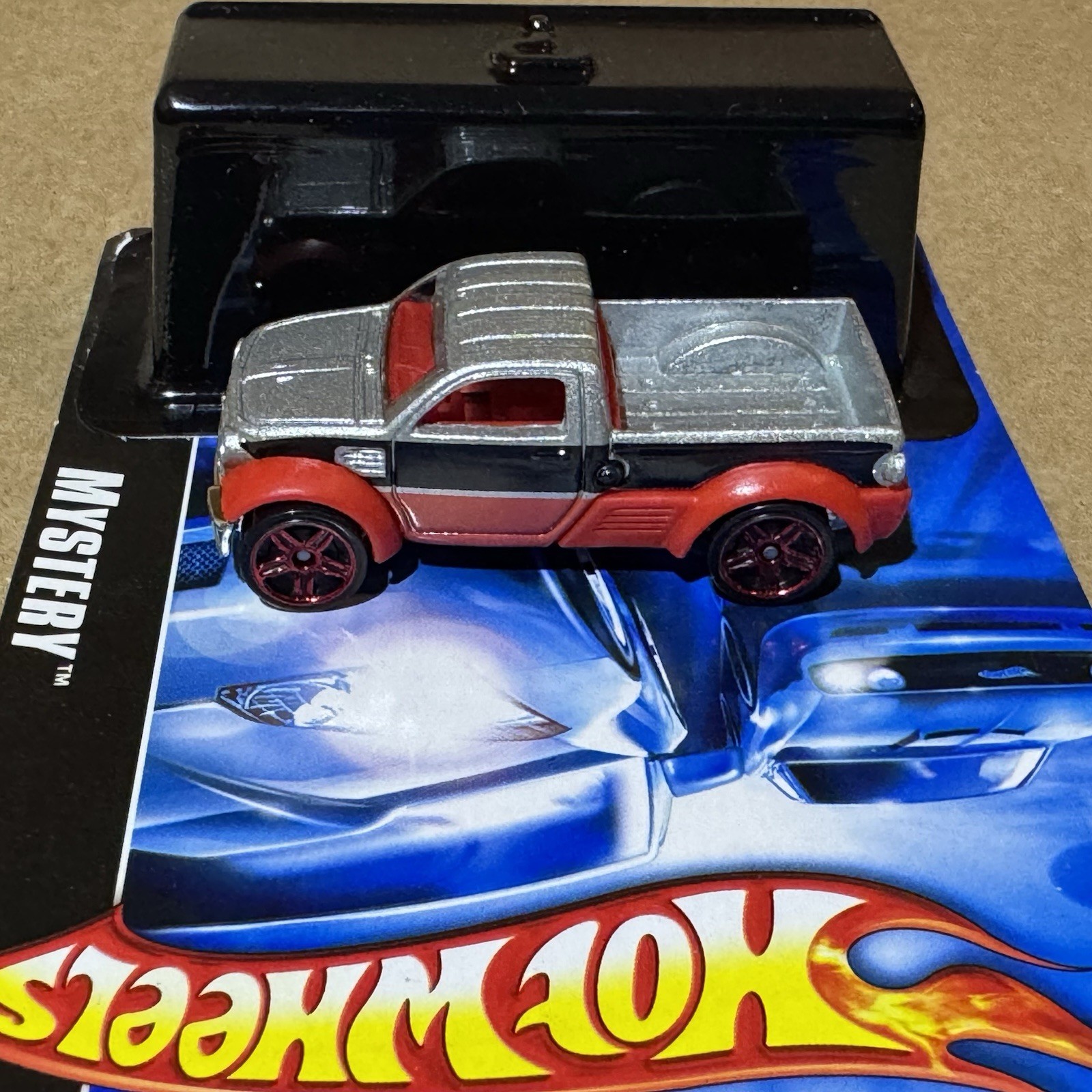 2007Hot Wheels Mystery Car Dodge M80 Pickup Truck Open w/Original Packaging