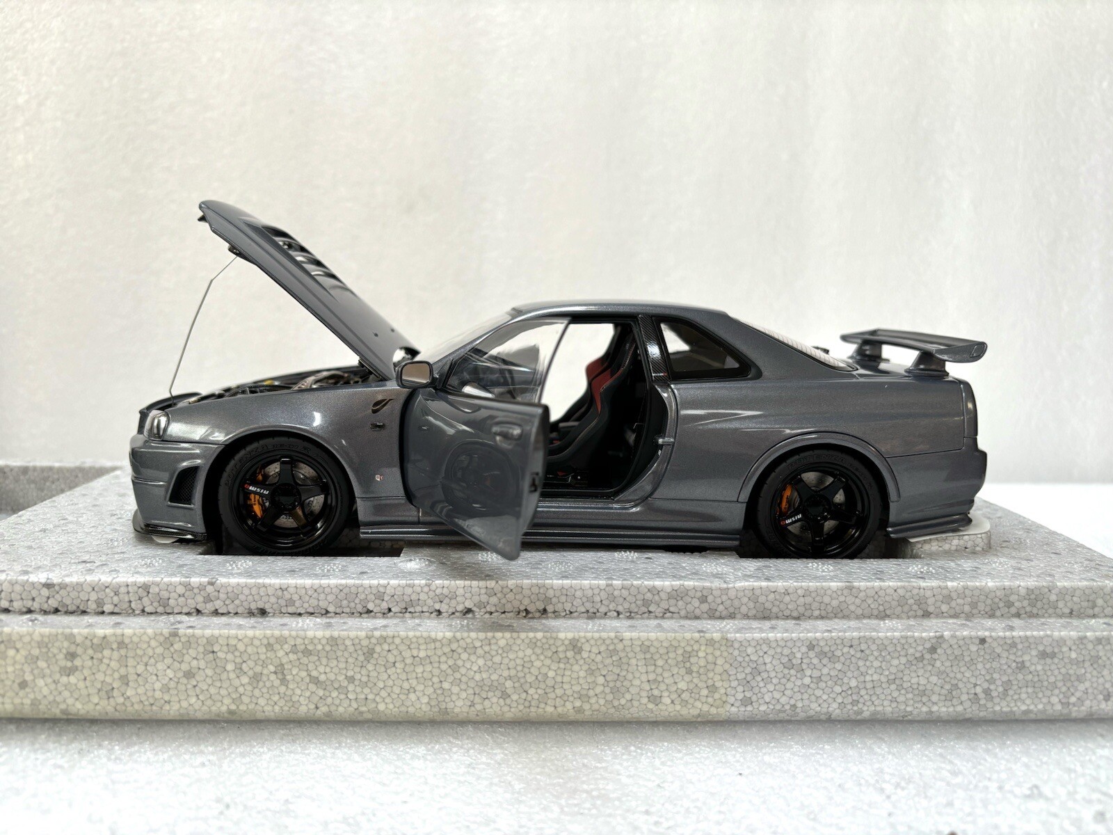 1/18 MotorHelix Nissan Skyline R34 GT-R Nismo Z-tune Gun Metallic Gray Diecast