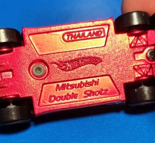 Hot wheels Mitsubishi Double Shotz Black And Red With Clear Glass Scale 1:64