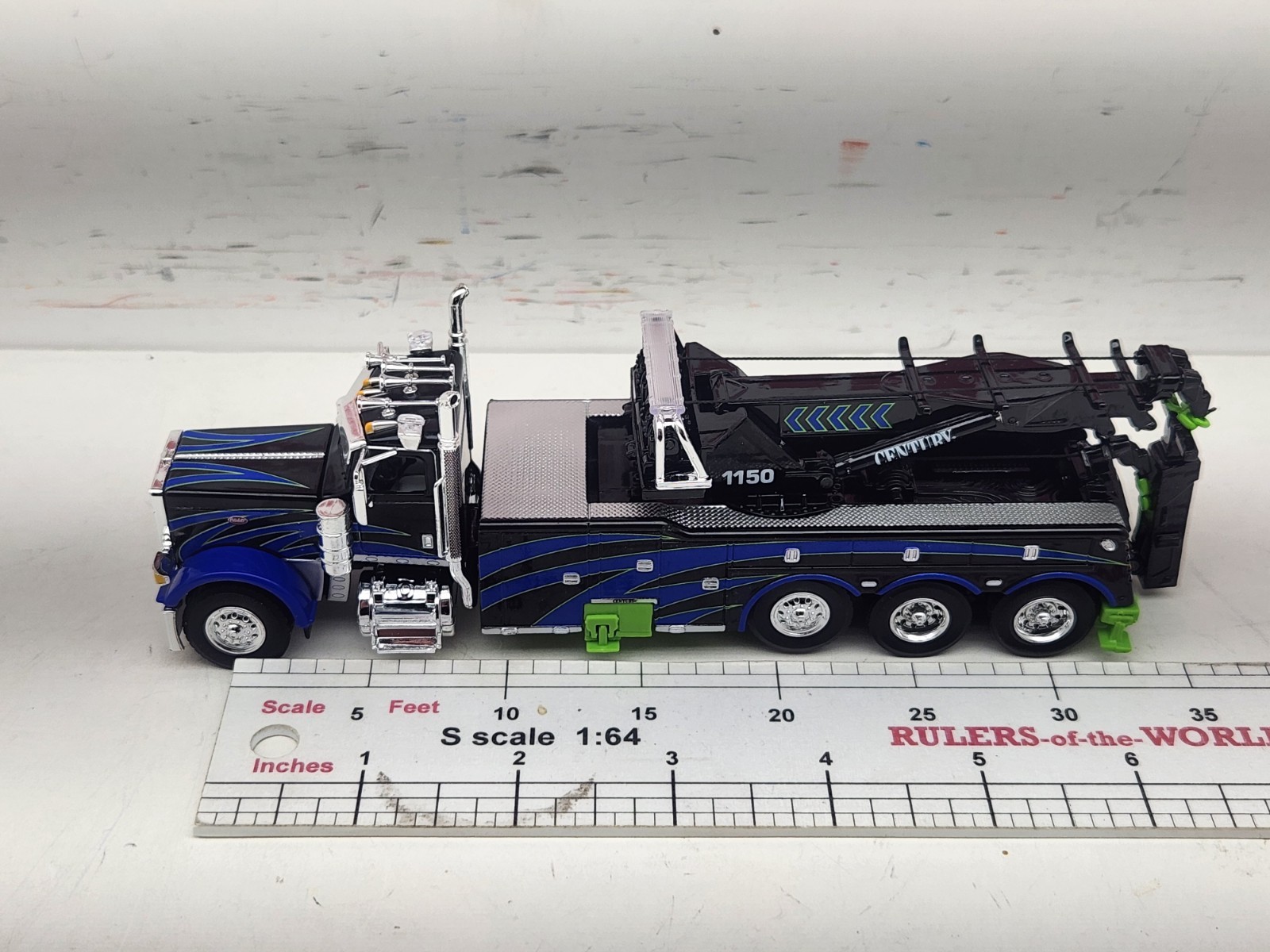 1/64 DCP/FG #60-2248 Black, Blue, & Green 389 DC Peterbilt Century 1150 Rotator