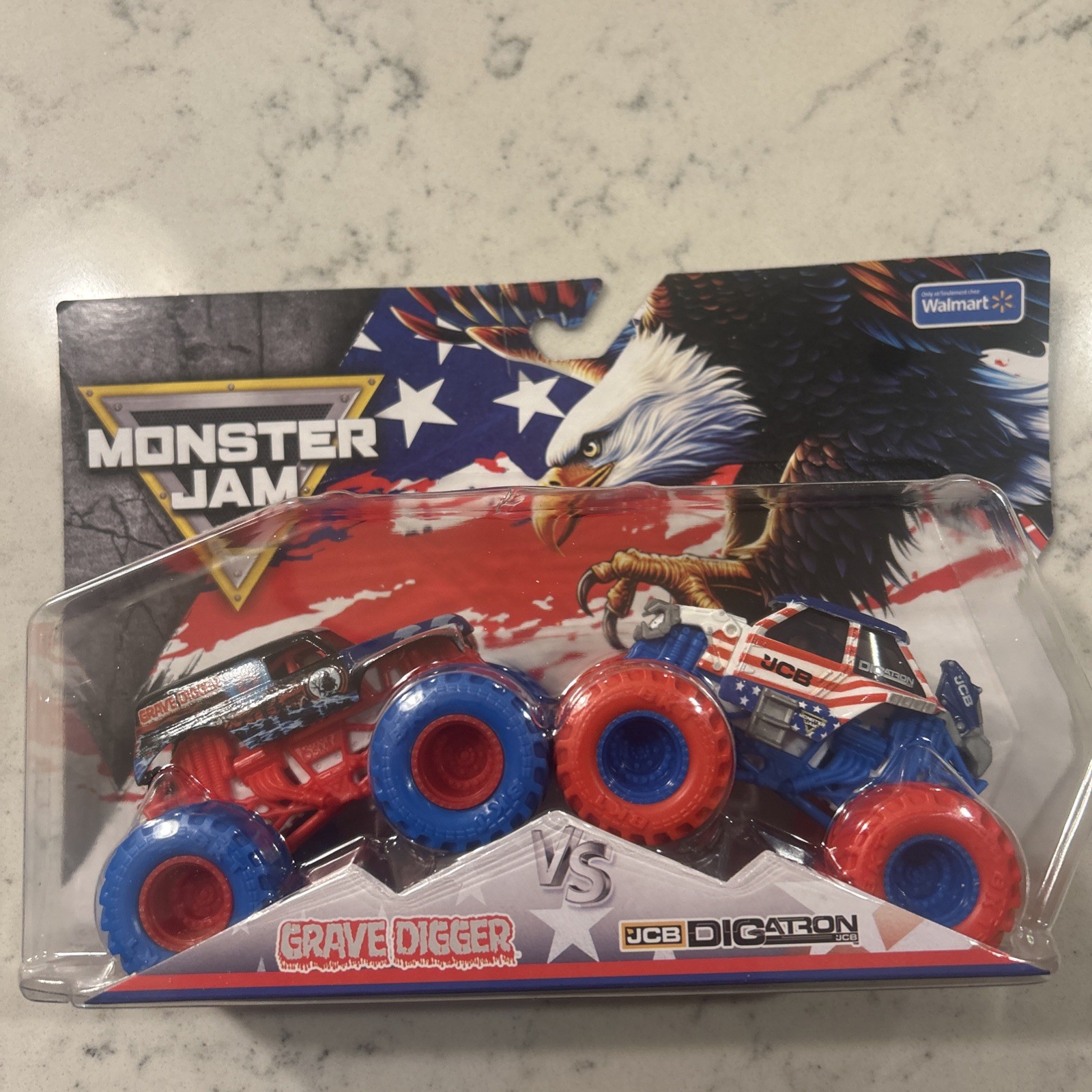 Monster Jam Grave Digger vs. JCB Digatron Die-Cast Stars-n-Stripes Edition