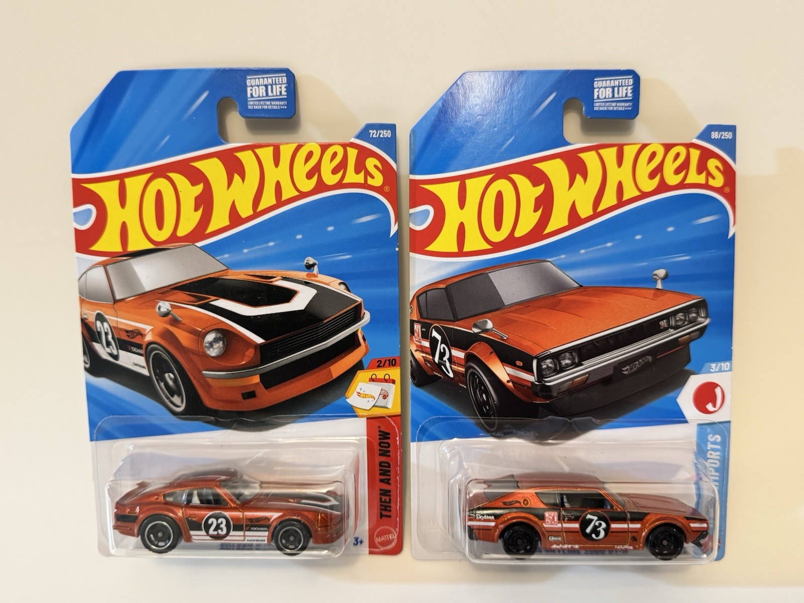 Hot Wheels JDM Nissan Skyline 2000GT-R + Fairlady Z Orange Then & Now – LOT OF 2