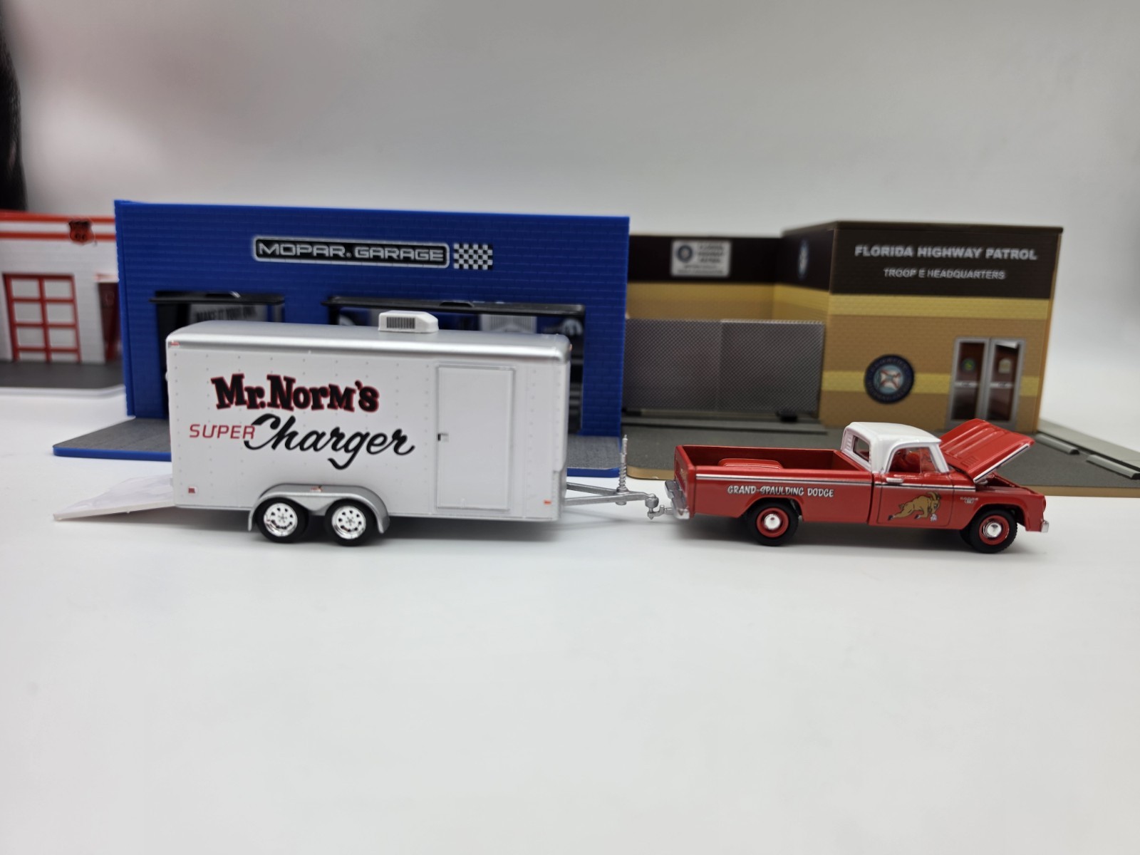 GREENLIGHT COLLECTIBLES 2024 LOOSE RED MR NORM’S 1966 DODGE D-100 W/CAR HAULER!!