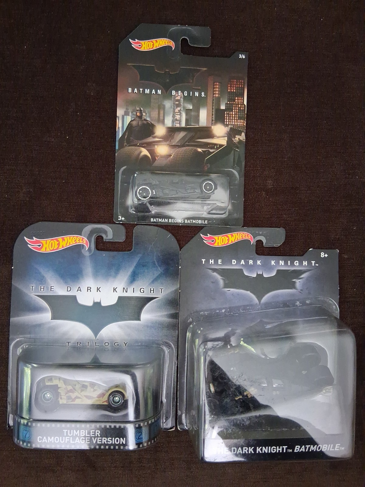 A set , hot wheels, the dark knight tumbler and black tumbler.CamouflageTumbl