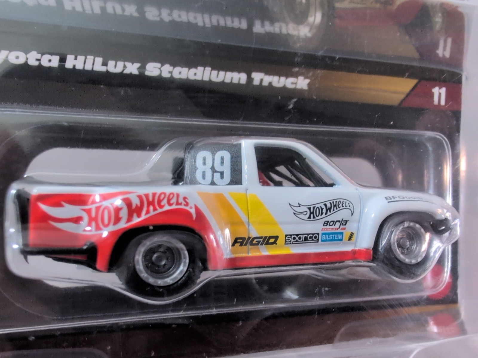 2024 Hot Wheels Elite 64 1989 Toyota Hilux Stadium Truck With Protector NEW!