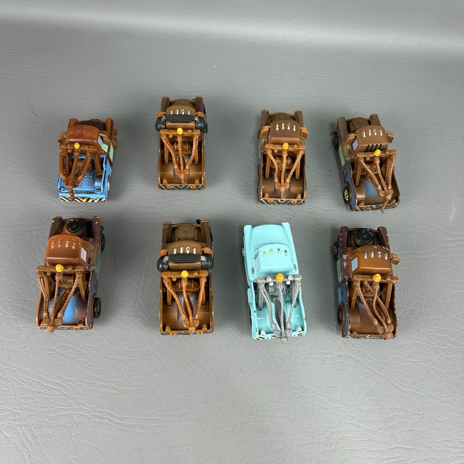 Disney Pixar Cars Diecast Tow Mater Lot of 8 One light blue Different Eyes