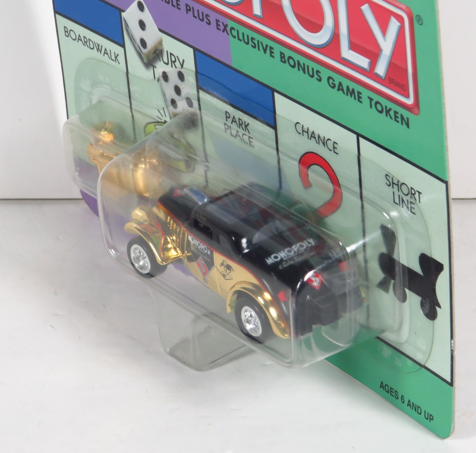 JOHNNY LIGHTNING Monopoly Vintage 1933 Willys Coupe 33 Gold Diecast KB Toys 1:64