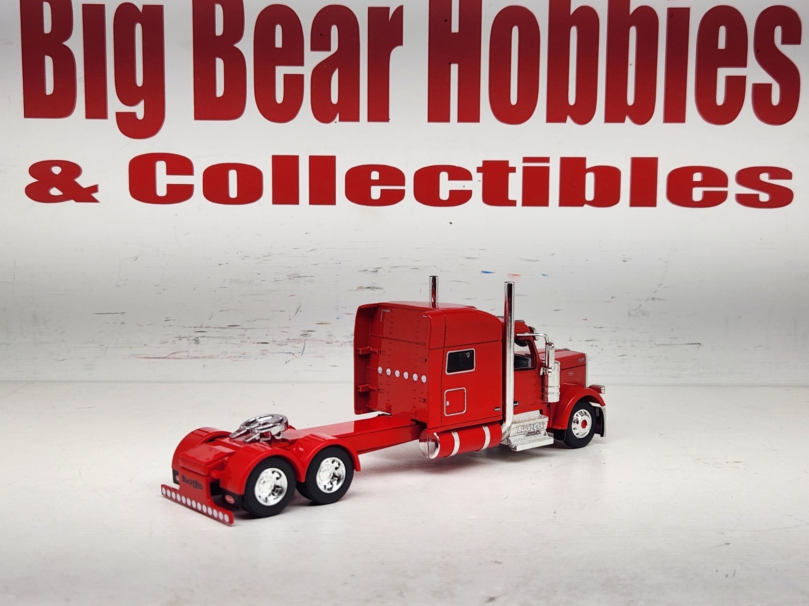 1/64 New DCP Red 589 Peterbilt 70″ Midroof Sleeper Blackjack