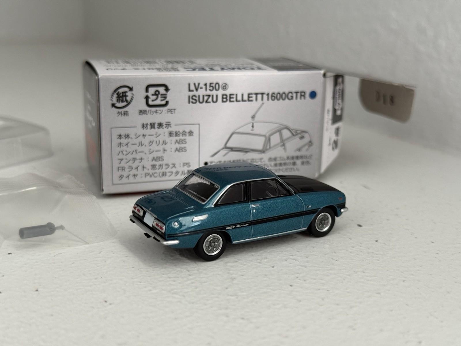 Tomica Limited Vintage 1:64 diecast LV-150d Isuzu Bellett 1600GTR in blue