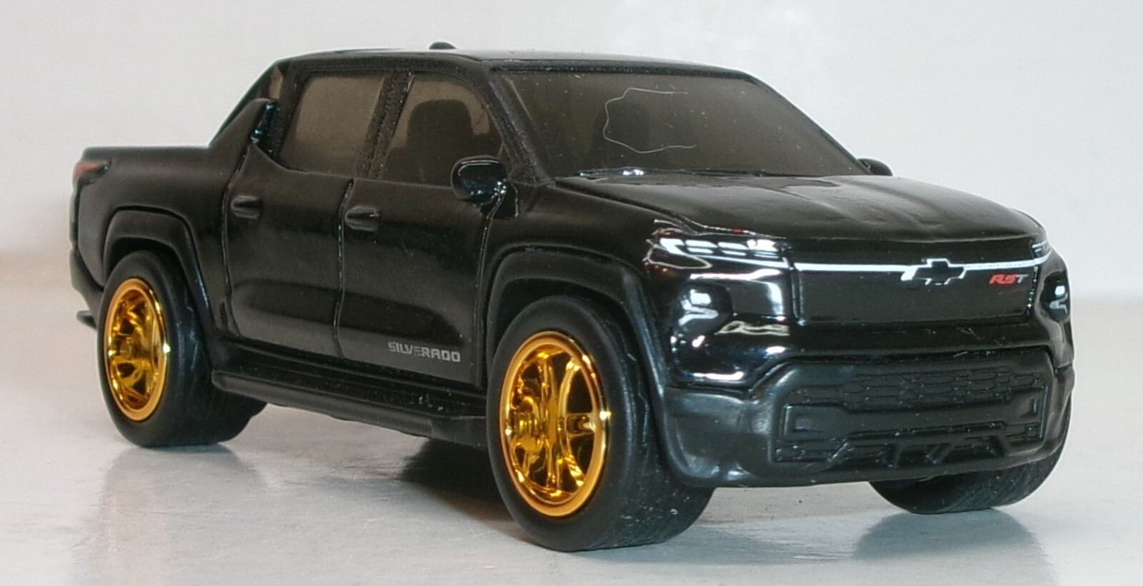 LOOSE 2024 HOT WHEELS 1:64 BLACK CHEVY SILVERADO EV RST WHEEL SWAP REAL RIDERS