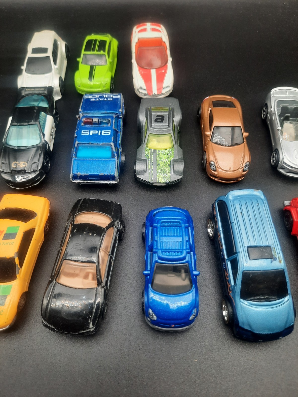 Mixed lot of 17 hot wheels/matchbox cars. Vintage to modern. Most fair shape.