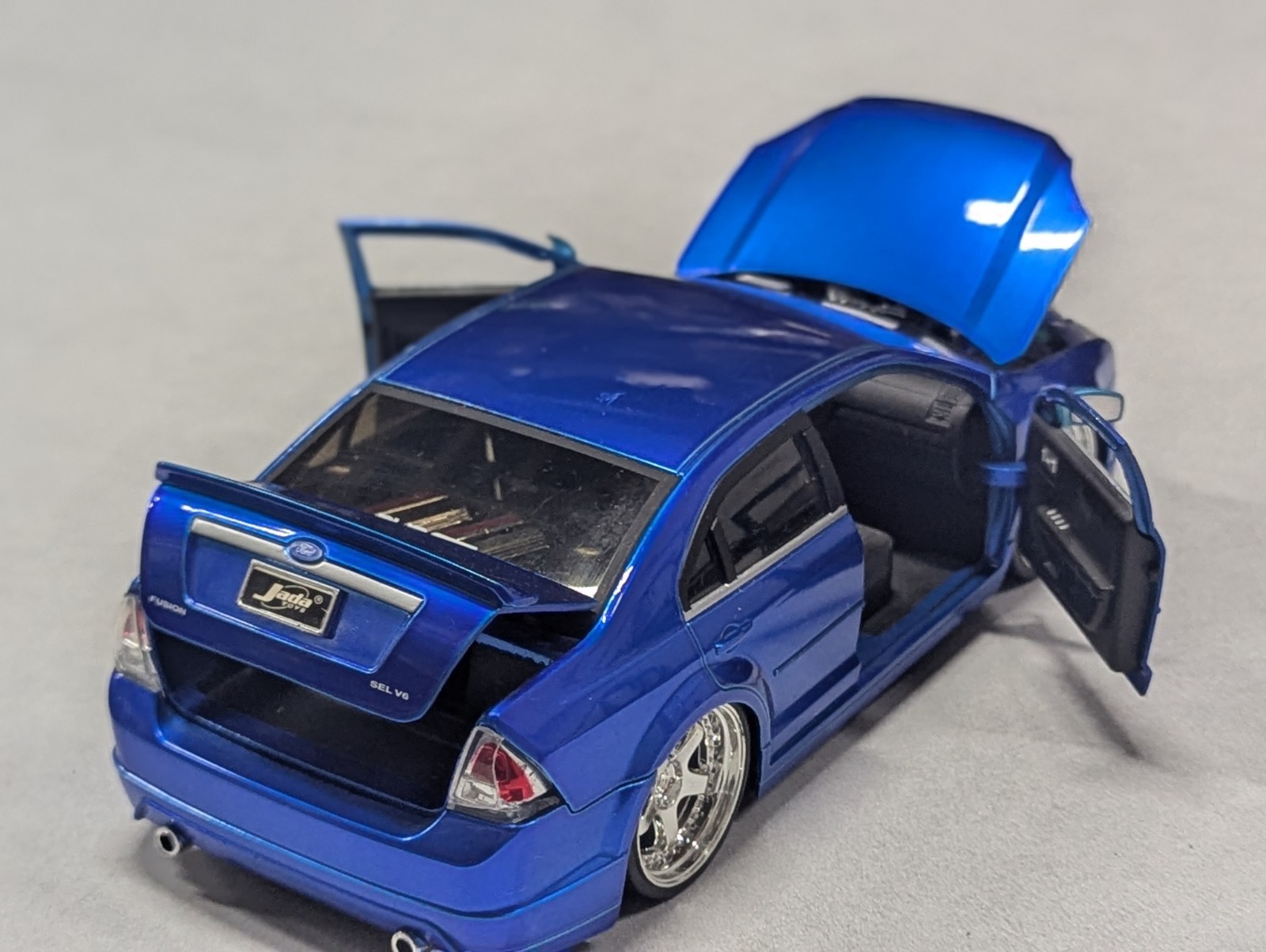 JADA DUB CITY 2006 FORD FUSION BLUE & RED 1:24 DIECAST MODEL USED Scuffs NO BOX