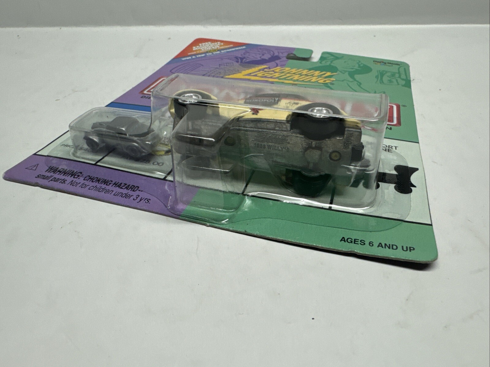 1/64 Johnny Lightning Monopoly 1933 Willy’s Black & Tan – One Price Shipping!