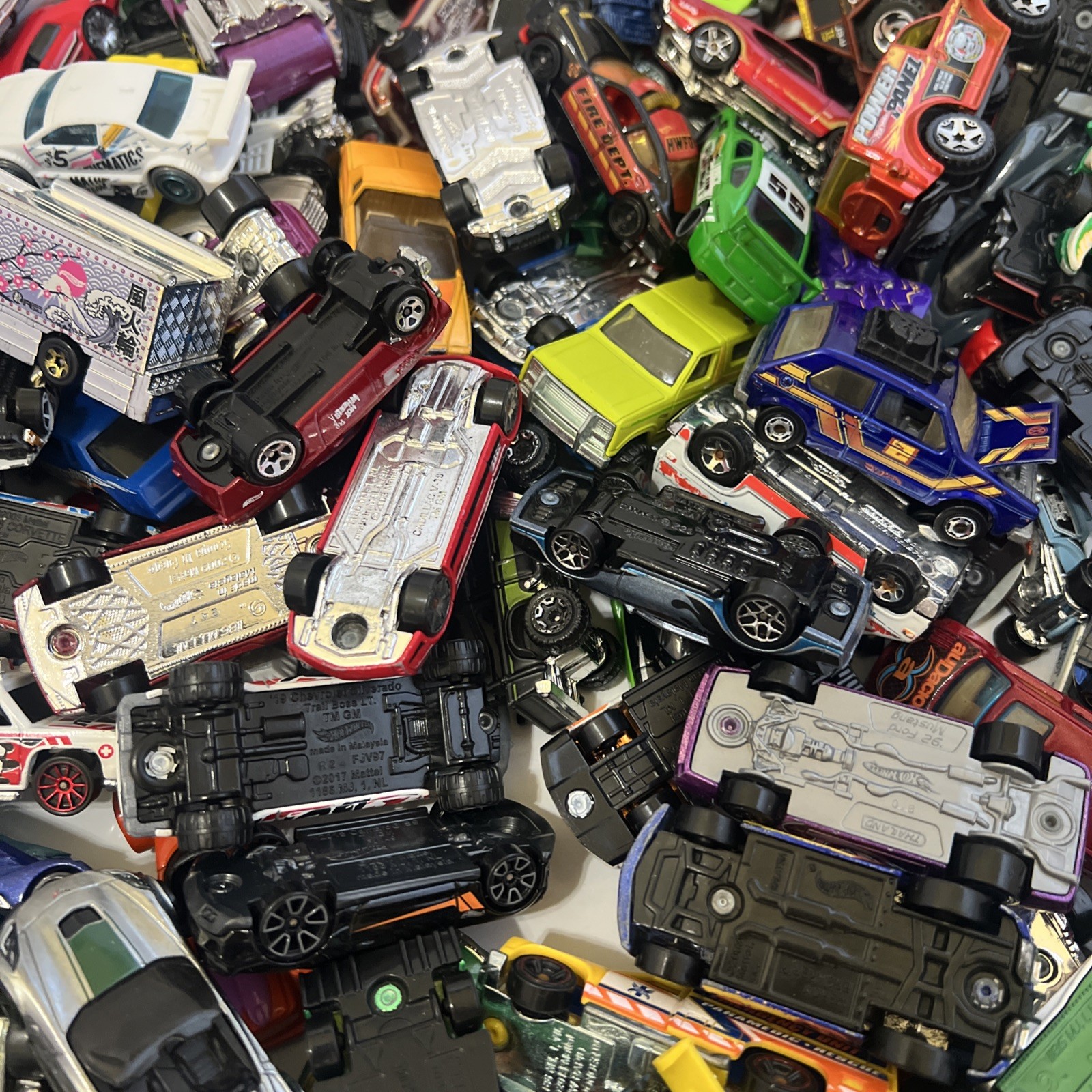 30 LBS Pounds of pure hotwheels. There are many different years and castings.