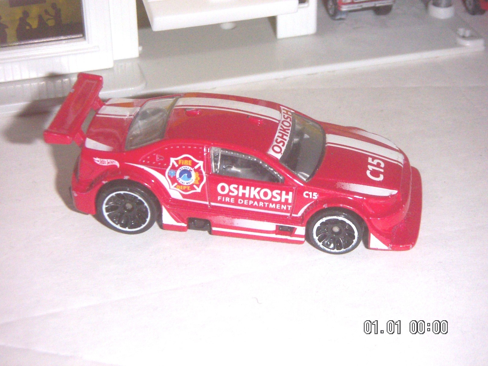 Hot Wheels 2012 HW Main Street Amazoom Oshkosh Fire Dept 1:64 scale