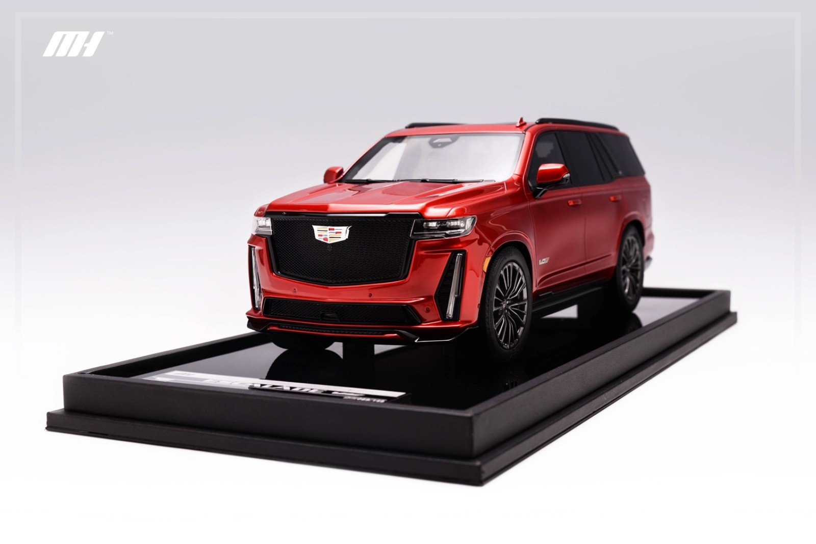 1/18 Motorhelix Cadillac Escalade V from 2022 in in red on Carbon Base