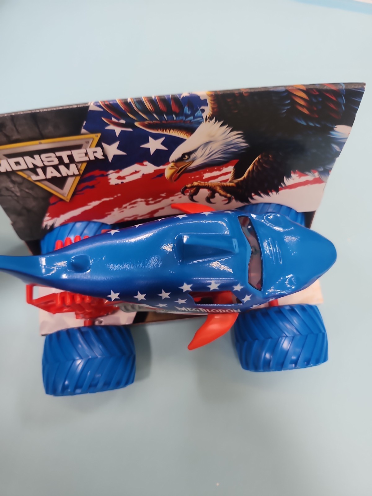 NEW RELEASE Monster Jam Megalodon Monster Truck 1:24 Stars & Stripes