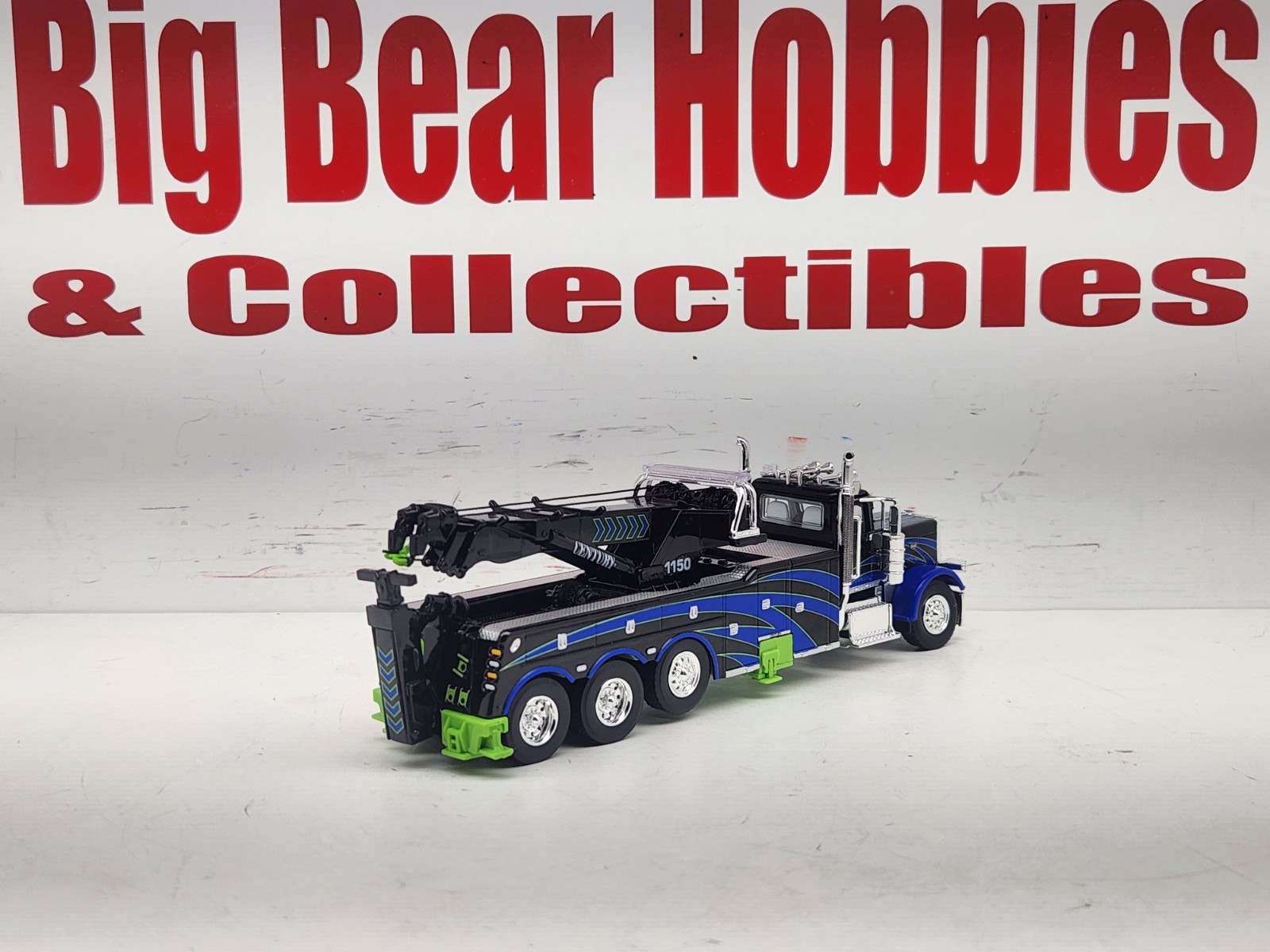 1/64 DCP/FG #60-2248 Black, Blue, & Green 389 DC Peterbilt Century 1150 Rotator