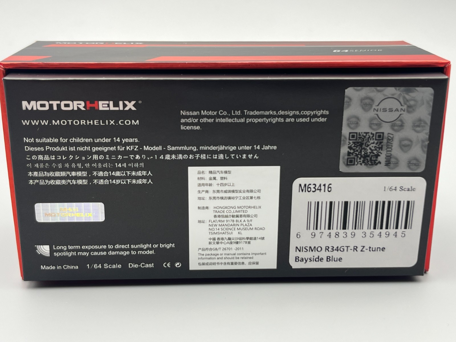 Nissan Skyline NISMO R34 GT-R Z-Tune Bayside Blue MotorHelix 1/64 scale display