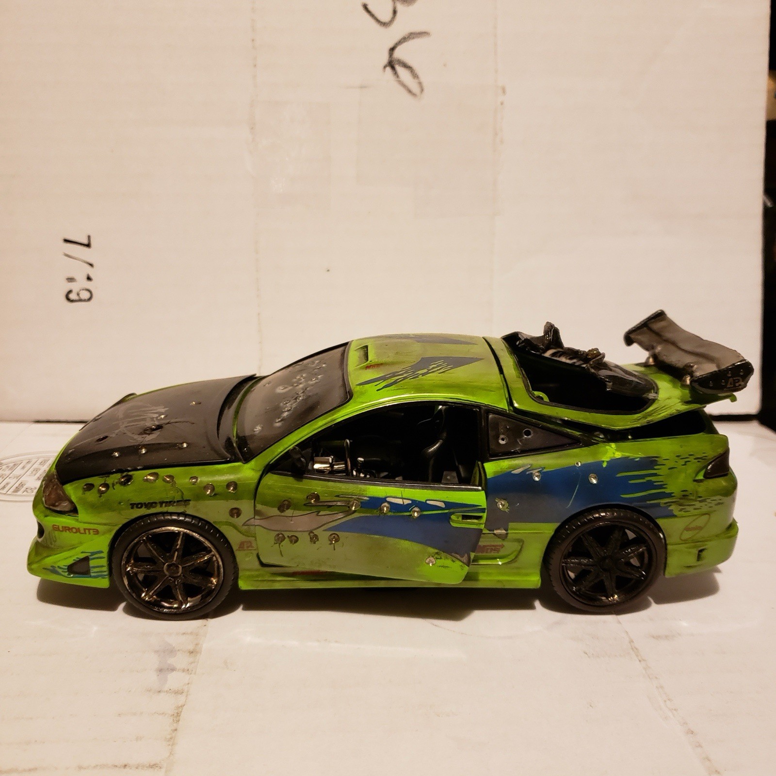Jada Toys Tuned Diecast Model Car Green/Black/Blue w/ Large Rear Wing