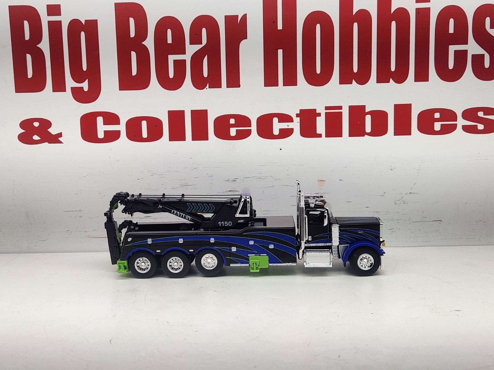 1/64 DCP/FG #60-2248 Black, Blue, & Green 389 DC Peterbilt Century 1150 Rotator