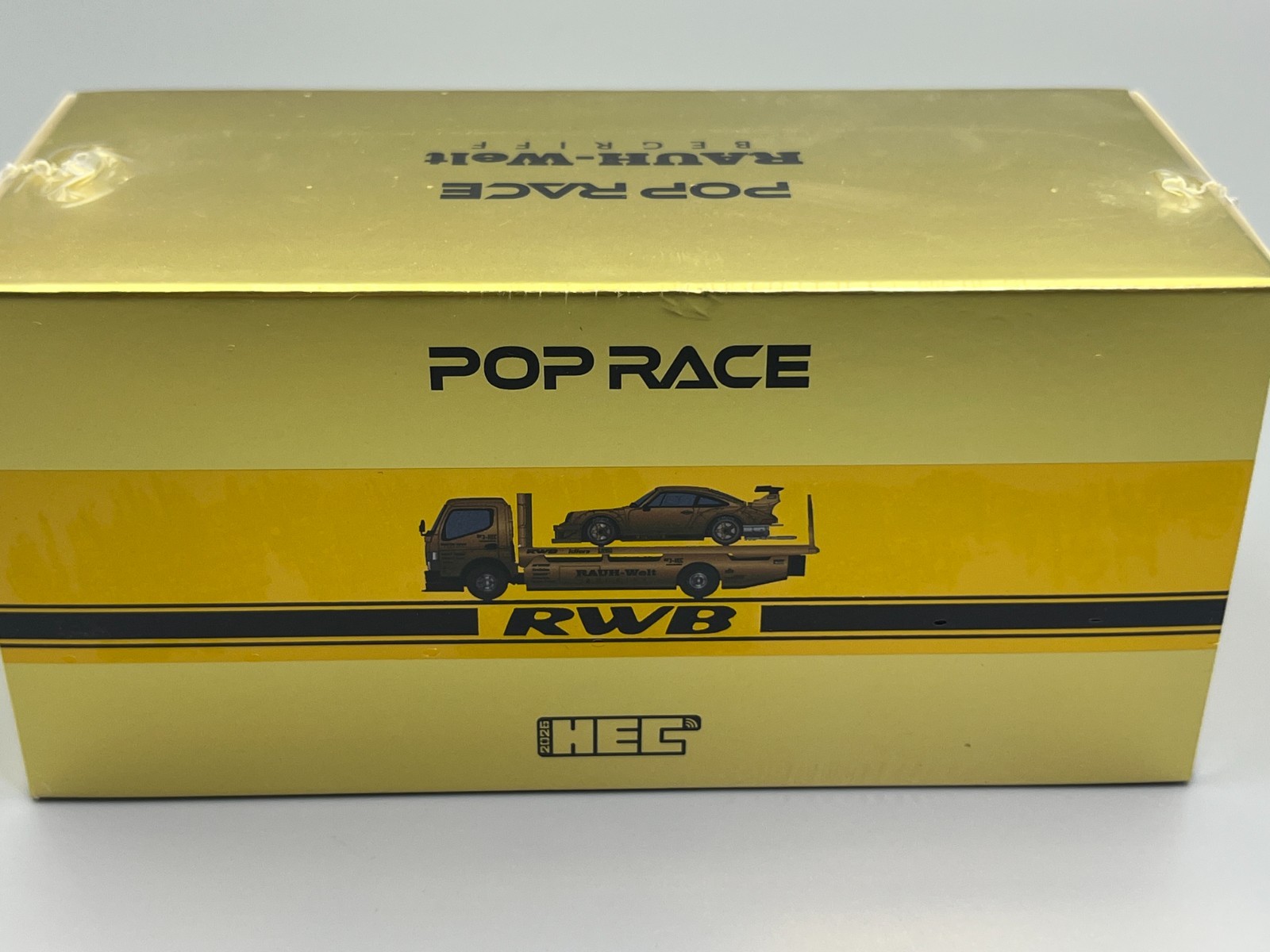 RWB 930 and Transporter Gold Porsche 911 HEC 2026 Exclusive Poprace 1/64 scale