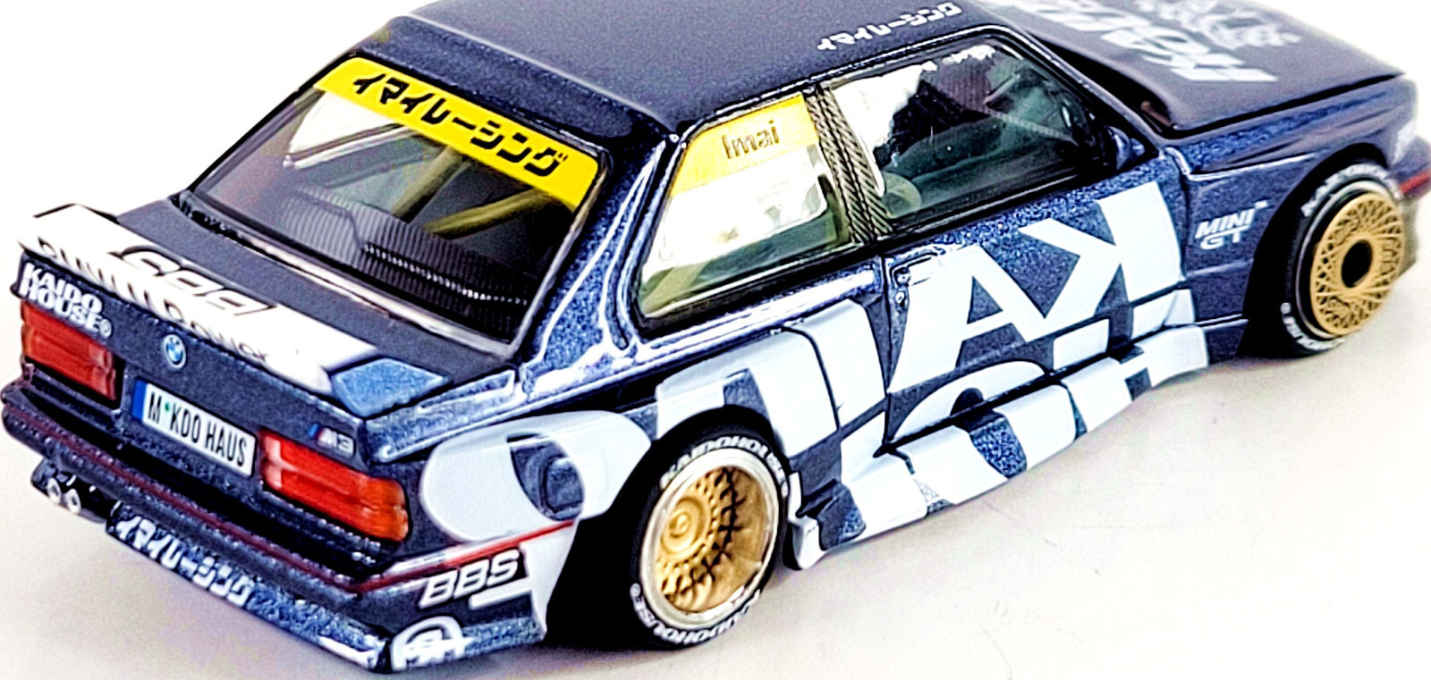 Kaido House x Mini GT BMW M3 Kaido Works V1 KHMG154 🟦⬜🟨 1/64