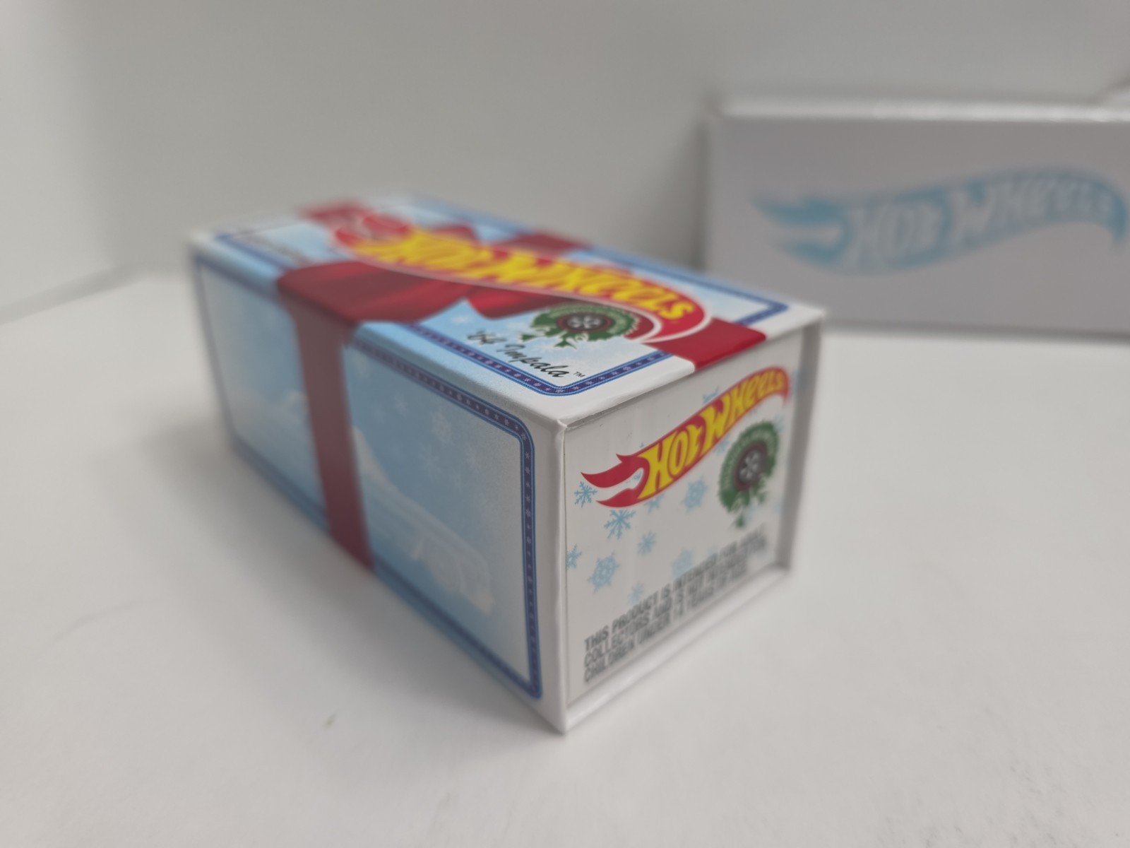Hot Wheels 2021 RLC Holiday Snowman Chevy ’64 Impala – Spectraflame Light Blue