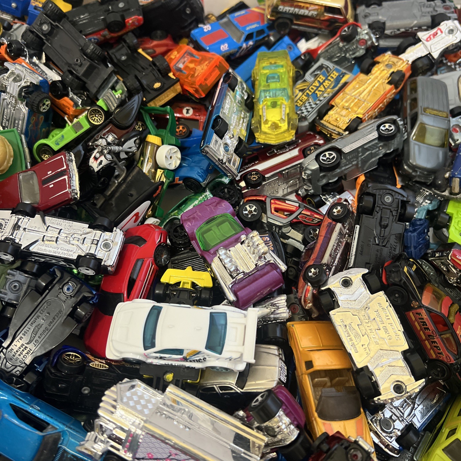 30 LBS Pounds of pure hotwheels. There are many different years and castings.