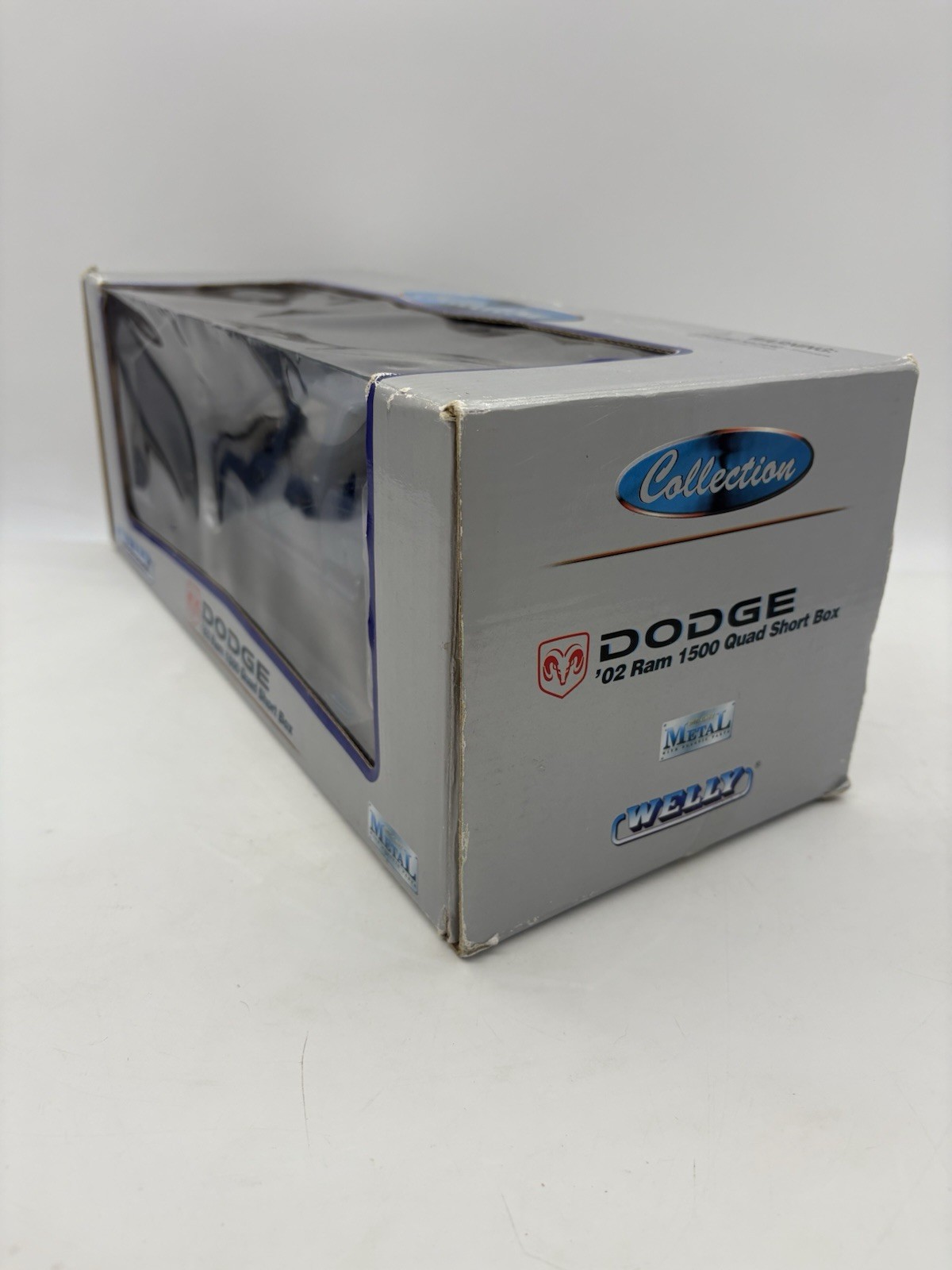 Welly 2002 Dodge Ram 1500 Quad Short Box Diecast Pickup Truck 1:19 W Box – Blue
