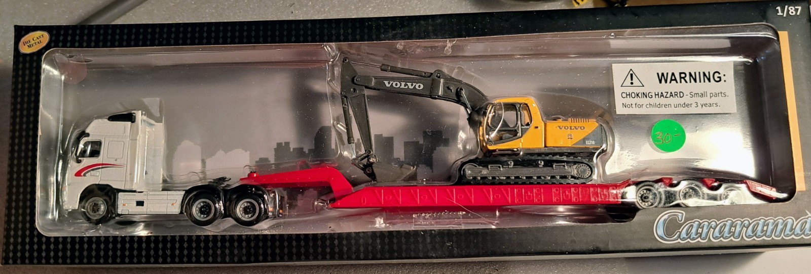 HO – Cararama 185-002 Volvo FH12 w/ Lowboy Trailer & Volvo EC210 Excavator – NIP