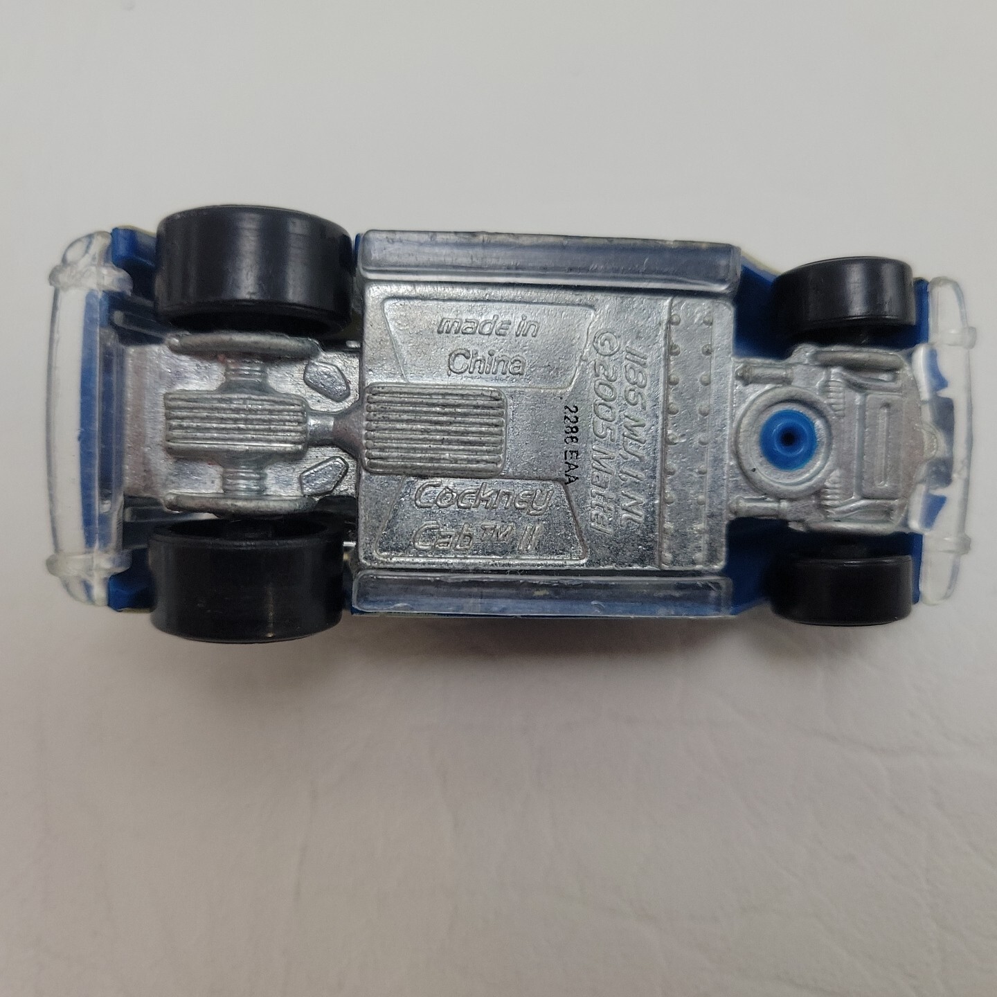 Hot Wheels 2005 Cockney Cab II. Blue, Yellow and White