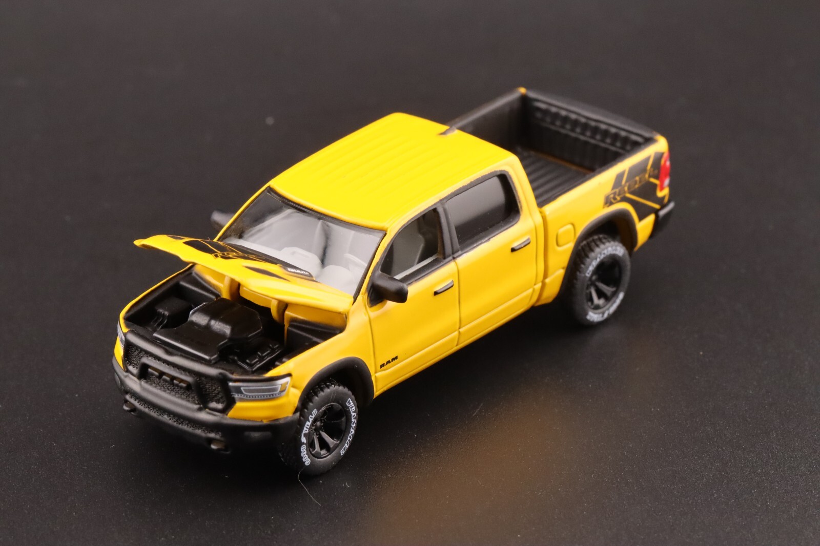 Auto World 2023 Dodge Ram Rebel Havoc Edition Baja Yellow AWSP164 A 1/64